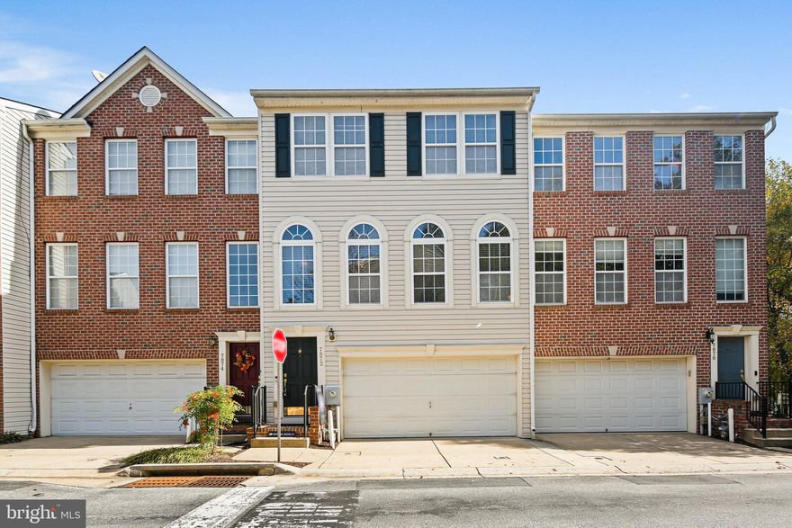 Bright and inviting with amazing updates, this beautiful townhome is a must-see! Conveniently located in Elkridge, this home offers an integrated garage and three finished levels, with calming paint colors, upgraded luxury vinyl plank flooring, and new carpet. The entry level features a spacious rec room that is filled with natural light and can easily be used as a home office. This level provides direct access to the two-car garage.  
Make your way upstairs to the main level, featuring an open-concept layout that is ideal for relaxing and entertaining. The living room flows into the kitchen, which features gorgeous quartz counters, a center island, and a new sink and faucet. The kitchen also includes room for a table with views of the pond. The upper level has three bedrooms, all with plenty of closet space, lots of light, and vaulted ceilings. The owner’s suite has a private full bath with double vanities. This home is situated on a premium lot backing to a pond providing peaceful morning and evening views of nature. The Oaks at Waters Edge has so much to offer including a community pool, clubhouse, and playground! You'll love living here!