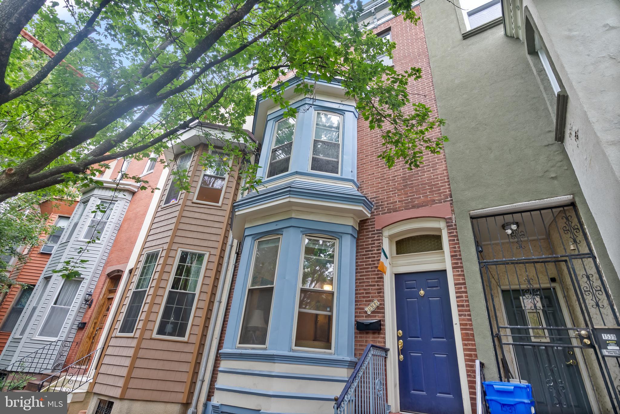 ***HIGHEST AND BEST OFFERS DUE BY TUESDAY SEPT 2ND AT 6PM***Welcome home to a rare opportunity on one of Passyunk Square's most desirable blocks! This 3-story, 4 bedroom, 2 bath home is your opportunity to own on the lovely tree-lined 1500 block of S 13th St. Conveniently located just blocks from S Broad St, East Passyunk Ave, public transportation and so much more! You're also not too far from the stadium district, the airport, Center City Philly and all that this city has to offer. Upon first glance, you'll notice the great curb appeal - a beautiful tree to provide your shade and your own stoop to sit and hang out. Enter through the foyer into the large living room with coat closet; dining room with large pantry closet; and nice-sized eat-in kitchen with good amount of cabinet and countertop space. This home has beautiful original hardwood floors throughout. The yard is expansive and extra long - a great place for entertaining! The basement is full and unfinished with mechanical systems, storage, and washer/dryer. The second floor has two nice-sized bedrooms with good closet space and beautiful floors. There is a 3-piece full ceramic tile bathroom as well. The 3rd floor has two additional bedrooms with closet space and one bedroom has an en-suite 3-piece full tile bathroom. This lovely home has a ton of charm and endless possibilities. Make your appointment today! Call this place your home!