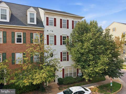 Photo of 8068 Genea Way #50, FALLS CHURCH, VA 22046 (MLS # VAFX2325802)