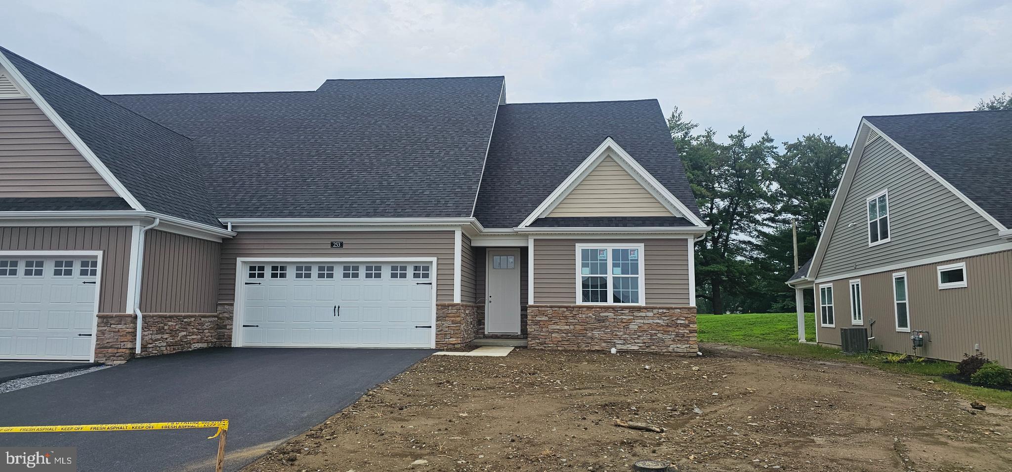 Discover the perfect blend of comfort, space, and convenience in Bellaride—the newest section of the sought-after Crossgates community in Millersville. This thoughtfully designed semi-detached home offers over 2,200+ square feet of versatile living space, ideal for multi-generational households, downsizers seeking flexibility, or empty nesters who love to host family and friends.
The main floor showcases an open-concept design that brings the kitchen, dining room, and great room together in one inviting space. The kitchen features a large island, perfect for gathering, while the great room is designed for both everyday living and entertaining. With two bedrooms and two full bathrooms on the first floor—including a private primary suite—this layout ensures the ease of main-level living. A first-floor laundry room adds an extra layer of convenience.
The second floor expands the possibilities, offering two additional bedrooms, a full bath, and a generous unfinished storage area that can easily transform into a game room, office, or hobby space. A full unfinished basement provides even more flexibility, whether for storage or future finishing. With a two-car garage, modern finishes, and thoughtful design, this home adapts to your lifestyle now and for years to come.
Life at Crossgates means more than just a home—it’s a community. Enjoy scenic walking paths, a ballfield, tennis courts, a public golf course, and a restaurant right within the neighborhood. You’ll be within walking distance to Millersville and just minutes from downtown Lancaster. Best of all, the HOA takes care of snow removal and lawn care, giving you the freedom to enjoy a low-maintenance lifestyle in a vibrant, welcoming community