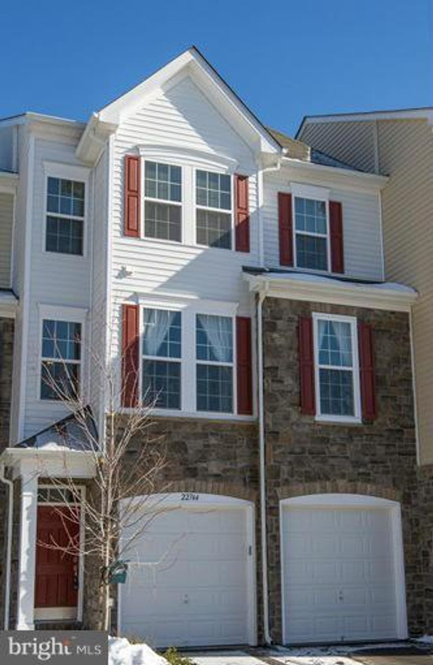 Fantastic 1 year new TH in sought after Brambleton!  Just under 2900 sf, 3 BR, 2.5 Bath beauty with HW on main level, Gourmet kitchen, ss apps, granite, island, upscale cabs, 2 decks. Gas FP in Fam Room, finished rec room with loads of space, 2 car garage. Spacious owners retreat, 2 W/I closets, lush bath and more. Walk to Town Center!  Please give show contact 1 hour notice.