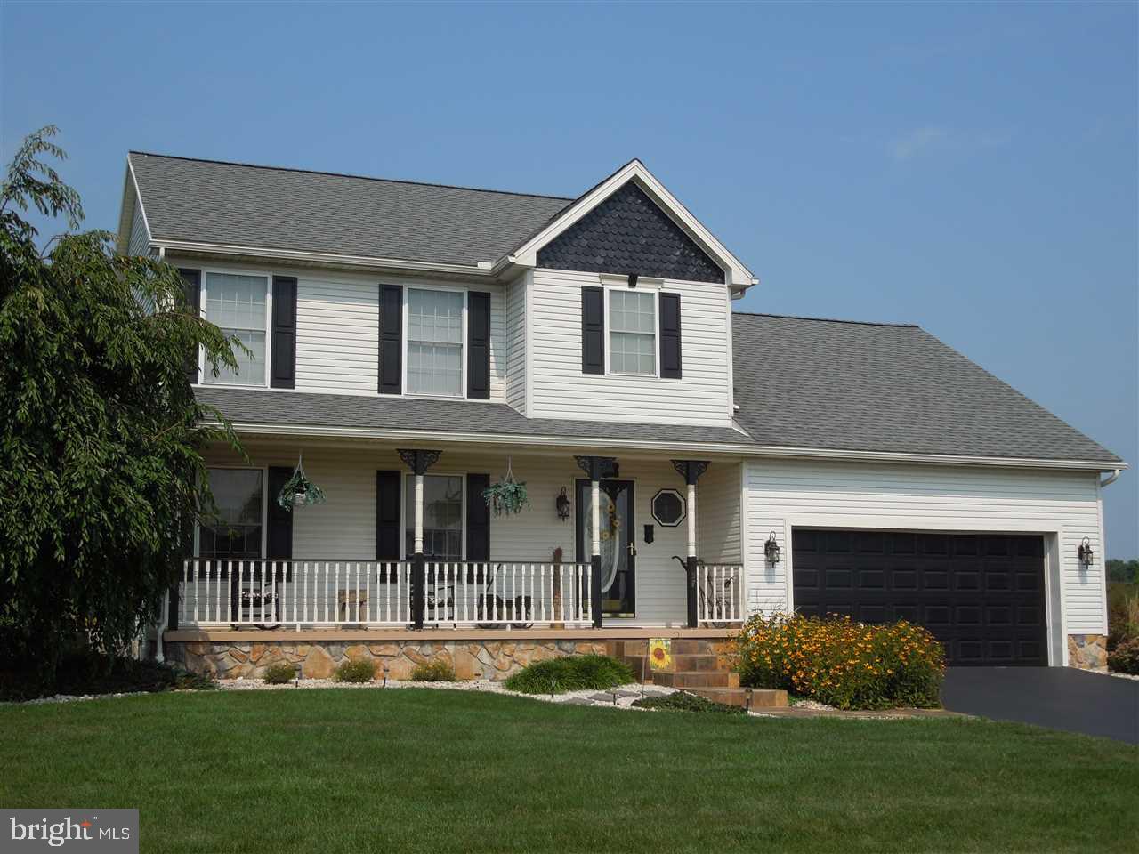 COUNTRY LOCATION ON .54 ACRE LOT * SPACE BETWEEN HOMES * LOVELY VIEWS * CATHEDRAL CEILINGS * SKYLIGHTS * BEAUTIFUL WHITE KITCHEN CABINETS * WOOD FLOORING * GAS FIREPLACE * SUN ROOM * TWO DECKS * COVERED PORCH * BREAKFAST AREA * FORMAL DINING RM * EXTRA LARGE GARAGE WITH SIDE DOOR * YOU WILL LOVE THIS PROPERTY *