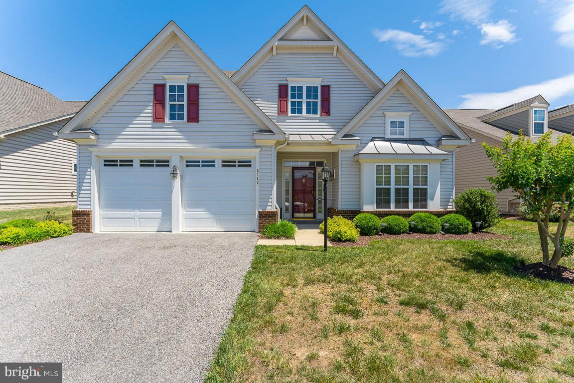 Wonderful 2 Bedroom, 2 Bath, 2-car Garage in the sought-after 55+ Community of Central Parke at Colonial Charles Subdivision. Entering the home into a wide and inviting foyer, your sight line continues all the way through this lovely home. You will love preparing meals in this Kitchen which offers an abundance of storage with gorgeous cabinetry, a Pantry, and lots of Counter Space. It features a glass cooktop, built-in microwave and wall oven. A large Island offers counter seating and is open to the breakfast area and Living Room. Vaulted ceilings, recessed lighting and a cozy gas fireplace complete the space. Glass French doors separate the Home Office off of this space. Glass siding doors lead to a patio for outdoor dining or entertaining. A small hallway leads to the Primary Suite that features vaulted ceilings, a Sitting Area, 2 Walk-In Closets and ensuite Primary Bath. The Primary Bath has Dual Sinks and an oversized Shower with bench. The second Bedroom is large and features private entry into the hall full bath. This hall Bathroom has a tub. Washer and Dryer in the Laundry Room convey. HOA fee includes mowing the entire lawn, installing mulch, pruning, snow removal from your driveway and sidewalk, trash removal, and use of the amazing Clubhouse which includes an indoor heated pool, an outdoor pool (Memorial Day to Labor Day), Sauna, exercise room, aerobic room, game room with billiards table, card room, Grand Ballroom, two-story lobby with comfortable seating and books. The clubhouse also includes huge bathrooms complete with lockers, showers, and a dressing area. The exercise room has treadmills, stationary bike, stair climber, weight machines, and free weights.