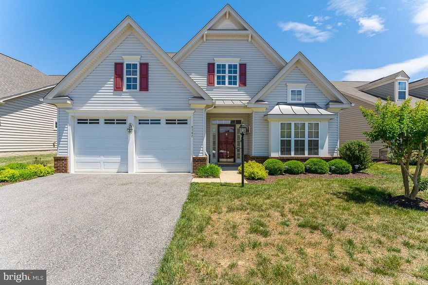 Wonderful 2 Bedroom, 2 Bath, 2-car Garage in the sought-after 55+ Community of Central Parke at Colonial Charles Subdivision. Entering the home into a wide and inviting foyer, your sight line continues all the way through this lovely home.  You will love preparing meals in this Kitchen which offers an abundance of storage with gorgeous cabinetry, a Pantry, and lots of Counter Space.  It features a glass cooktop, built-in microwave and wall oven.  A large Island offers counter seating and is open to the breakfast area and Living Room.  Vaulted ceilings, recessed lighting and a cozy gas fireplace complete the space.  Glass French doors separate the Home Office off of this space.  Glass siding doors lead to a patio for outdoor dining or entertaining.  A small hallway leads to the Primary Suite that features vaulted ceilings, a Sitting Area, 2 Walk-In Closets and ensuite Primary Bath.  The Primary Bath has Dual Sinks and an oversized Shower with bench.  The second Bedroom is large and features private entry into the hall full bath.  This hall Bathroom has a tub.  Washer and Dryer in the Laundry Room convey.  HOA fee includes mowing the entire lawn, installing mulch, pruning, snow removal from your driveway and sidewalk, trash removal, and use of the amazing Clubhouse which includes an indoor heated pool, an outdoor pool (Memorial Day to Labor Day), Sauna, exercise room, aerobic room, game room with billiards table, card room, Grand Ballroom, two-story lobby with comfortable seating and books. The clubhouse also includes huge bathrooms complete with lockers, showers, and a dressing area.  The exercise room has treadmills, stationary bike, stair climber, weight machines, and free weights.