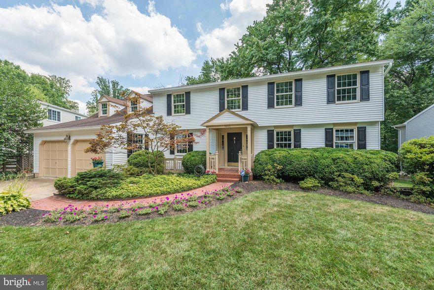 Custom built Colonial 1.5 miles from Vienna metro.  Renovated kitchen w/ custom cabinetry, granite, and stainless steel.  Newly refinished hardwood floors throughout main level.  2 story family room filled with windows.  Lower level suite with living room, kitchen, bedroom, and bath. Newer HVAC and windows.  Freshly painted and professionally landscaped.  Just move in