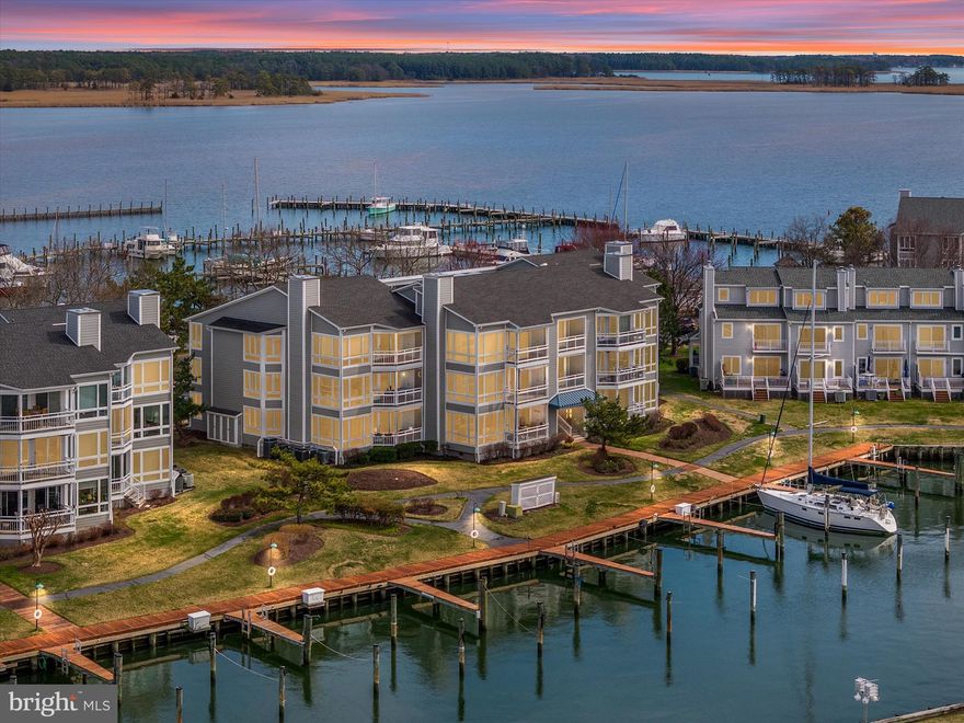 Waterfront Luxury—Fully Remodeled, Move-In Ready & Spectacular Views!
Welcome to Oyster Cove, Kent Narrows’ most sought-after waterfront community! This stunning first-floor unit is a true showstopper, offering every upgrade imaginable—so you can move right in and start living your waterfront dream immediately!

From the moment you step inside, you’ll be captivated by the floor-to-ceiling windows that showcase the absolute best water views in Oyster Cove. Imagine watching fireworks light up the sky year-round from your private balcony, with breathtaking sunsets painting the horizon every single evening—this is truly waterfront living at its finest!

Sophisticated one-level living at its finest—no stairs, just effortless luxury. Expansive floor-to-ceiling windows in the dining and living areas invite an abundance of natural light while showcasing breathtaking panoramic views.

And the best part? Everything in this home is brand new! The sleek, modern chef’s kitchen features stunning white cabinetry, Brazilian Marble Countertops, and high-end stainless steel appliances—a true dream for both cooking and entertaining. New windows and sliders flood the space with natural light, highlighting the gorgeous wood floors throughout. The home is also equipped with a new energy-efficient heat pump, hot water heater, and a whole-home water filtration system for complete comfort and peace of mind. Plus, a brand-new LG Slim Washer/Dryer Unit adds modern convenience!

It’s as if this home leapt straight off the pages of HGTV and landed right in your lap! There’s nothing to update, nothing to fix—just unpack and start enjoying. And with your very own 40-foot boat slip, you can be out on the water in minutes!

This is the only unit like this on the market—don’t miss out! Come see for yourself and envision your summer here—soaking up the sun, enjoying waterfront dining, and experiencing unforgettable views from your new dream home.