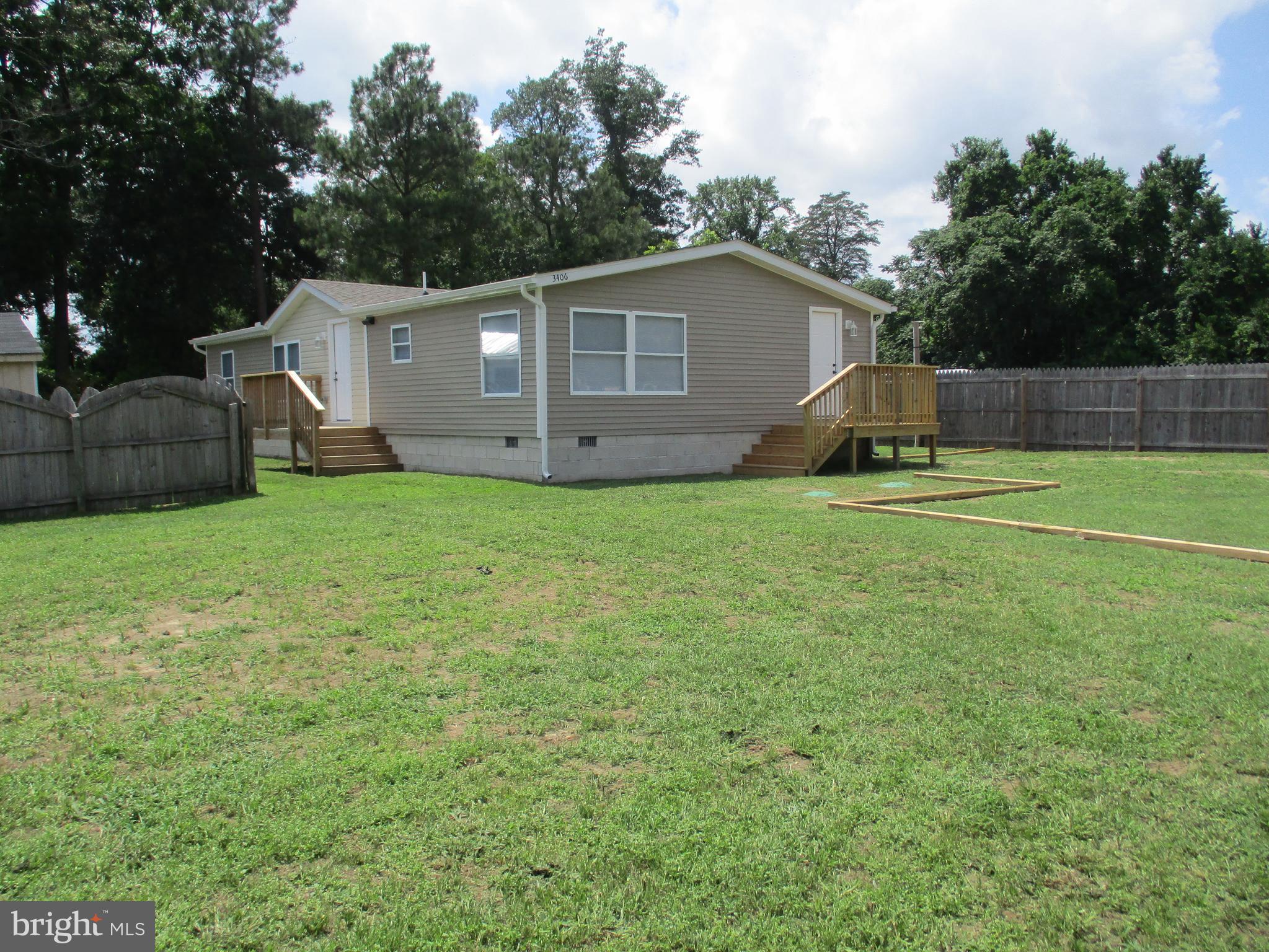 Totally renovated doublewide. beautiful tile work,large kitchen. new foundation, electric, cac
New dry wall, flooring, roof, welland septic. New concrete pad in rear yard ready for new shed