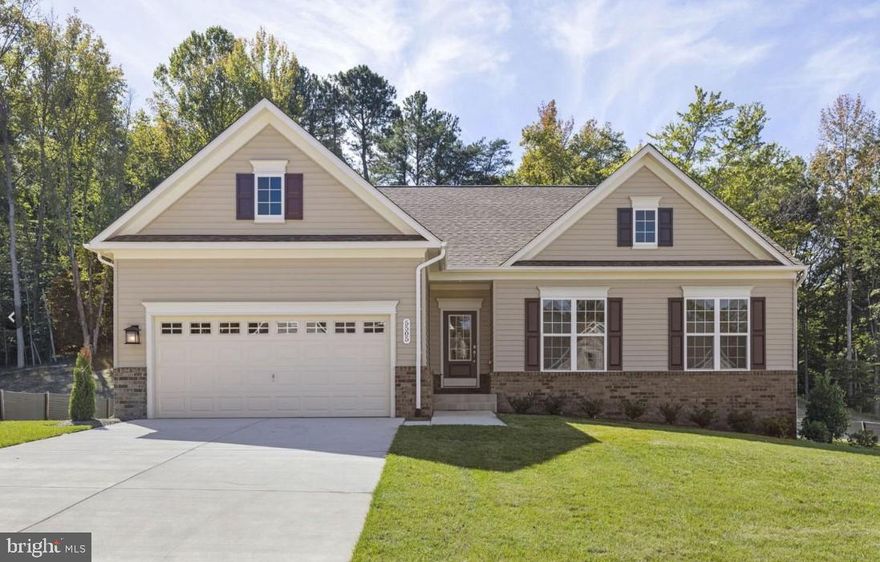 *$20,000 closing help available when using Seller's preferred lender* 
Don't miss your chance to own one of the last new construction ramblers in The Villages of Savannah!
This beautifully appointed home has everything you need on one level including a stunning kitchen with stainless steel appliances and a coveted bedroom level laundry room with a brand-new washer and dryer. The open floor plan is perfect for entertaining with wide plank luxury vinyl flooring that flows throughout the foyer, living room, kitchen, and dining room.  Step outside onto the spacious deck and enjoy the serene wooded views. The finished basement offers even more space to relax or entertain, with a fourth bedroom and a full bath. There's also plenty of room for storage or a home office.  The Villages of Savannah is an upscale community developed and built by Mid-Atlantic Builders. Residents enjoy tree-lined streets and tranquil sidewalks. The community is conveniently located minutes from major commuter routes such as Route 5 and Route 301, with easy access to shopping, dining, and other amenities.  This is your chance to own a piece of paradise in The Villages of Savannah. Don't miss out on this rare opportunity!