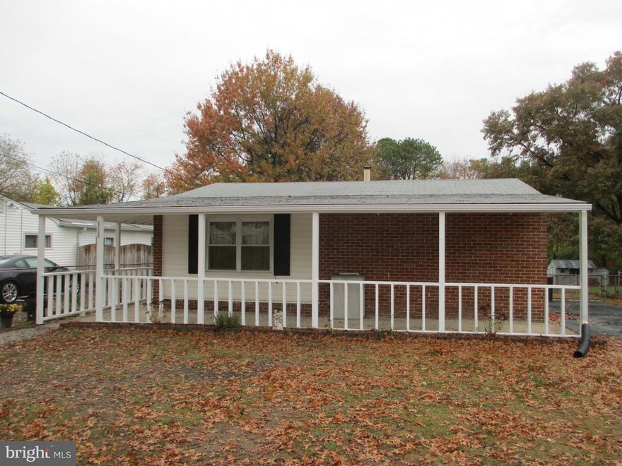 INVESTOR ALERT! Centrally located in well established neighborhood. Needs TLC, Front porch, large backyard.  Use your imagination, and this will be a great home.