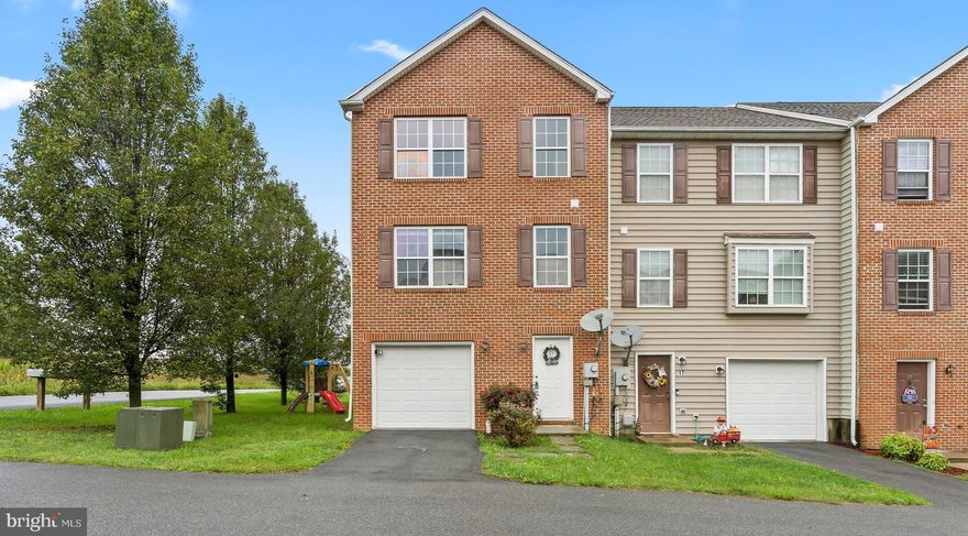 This beautiful, brick front town home is situated on a corner lot with picturesque country views! Conveniently located less than 1 mile from the exit to route 81, yet sits in a quiet cul-de-sac  across from cornfields in a community with only 10 homes.  The HVAC and hot water heater were replaced in the last 2 years!  Open concept living with a huge kitchen with newer stainless steal appliances and ceramic tile flooring.  All appliances convey with the property.  Living room with gas fireplace and back deck.  This property has everything you need!