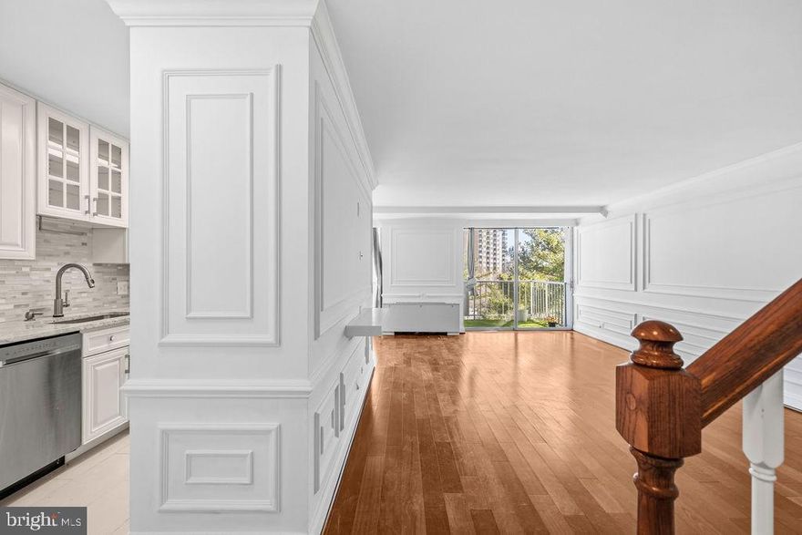 Freshly painted and featuring almost-new wood flooring throughout, this spectacular two-level, 2-bedroom, 2.5-bath condo in The Fountains is move-in ready. All bathrooms have been fully renovated with elegant marble floors and glass shower doors, offering a modern and upscale feel. The custom kitchen cabinets are both elegant and functional, providing ample storage with plenty of cabinets and drawers. Enjoy great lighting and generous counter space—perfect for everyday living or entertaining guests. The main level offers a spacious living room and dining area just off the kitchen, creating an open and inviting layout. Step outside to your private balcony, which boasts one of the nicest views in the community—ideal for relaxing or entertaining. Upstairs, you’ll find two large bedrooms. The primary suite includes a full bathroom and a generous closet. The second bedroom also offers excellent space and comfort. Located in a prime commuter-friendly location close to shopping, dining, and entertainment. Community amenities include a parking garage with one assigned space, additional surface parking, private storage space, swimming pool, fitness center, and more. Convenient laundry room located on the same floor.