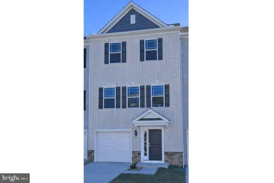 Beautifully three-story townhome offering space, comfort, and convenience. This home features 3 bedrooms and 2.5 bathrooms, along with a finished ground level that provides flexible space for a family room, office, or recreation area, plus an attached garage. The spacious eat-in kitchen includes a center island, perfect for casual dining, entertaining, or everyday living. Upstairs, the primary suite offers a private retreat with an en-suite bathroom and a generous walk-in closet. Ideally located near shopping, dining, and everyday conveniences, with quick access to Route 50, making commuting and travel a breeze.