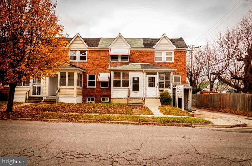 Charming Rowhome  features 3 bedrooms, 2 baths, covered front porch, hardwood floors & partially finished basement w/ bar, separate laundry/mechanical room and full bath. Seller must comply with HUD Guidelines 24 CFR 206.125 and property is sold  as is . >> AGENTS   SEE MLS  VIEW DOCUMENTS  TAB FOR OFFER INSTRUCTIONS/DISCLOSURES.