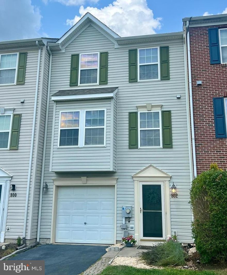 Nicely updated townhouse in great location close to everything!  Upgraded flooring throughout entire house. Kitchen has stainless steel appliances and double oven gas range.  Beautiful master bath and master suite.  New roof and air conditioner installed in 2020, new hot water heater last year.  One car garage with drive way and fenced in back yard.  Why rent when you could own for less!