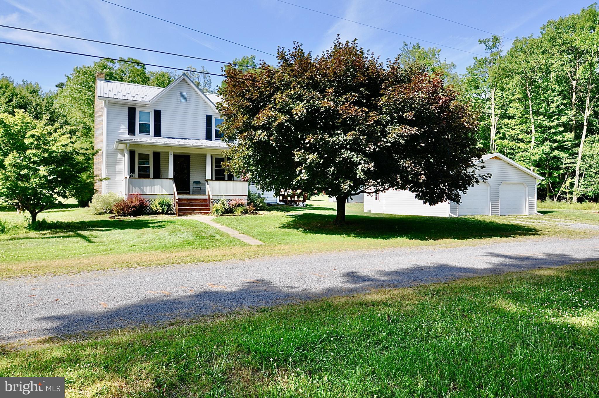 Wonderful 2 story home on a corner, one half acre level lot just west of Houtzdale Borough in quiet Woodward Township. Move right in! Large refinished kitchen, office, den, living room and full bath on the main level, 4 bedrooms and full bath on the second level. 2 car detached garage, 2 nice sheds, great yard to play in! Low taxes and cost of living. Woodward Township is a great place to live!