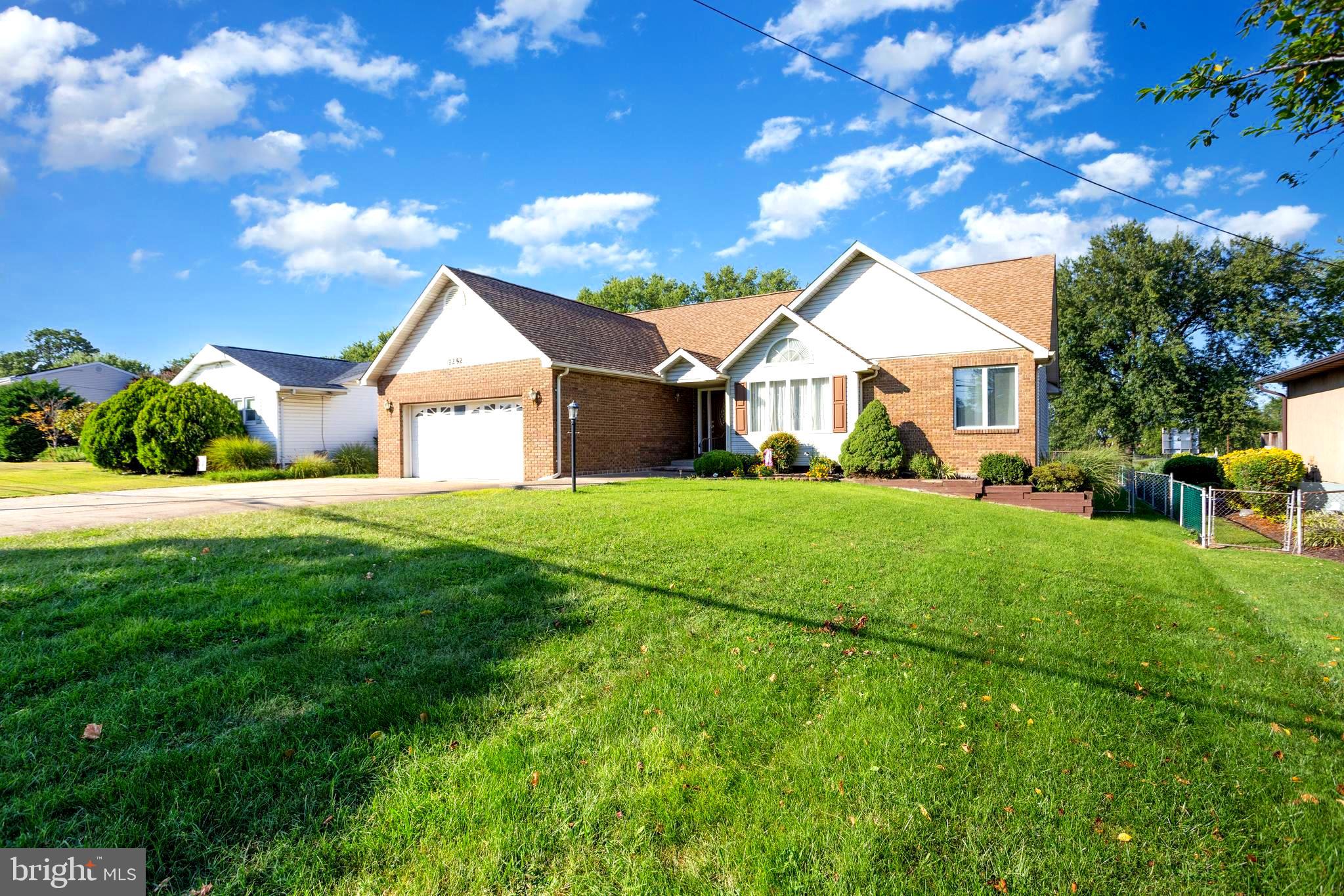 Nestled in the serene enclave of Dundalk Farms, this exquisite ranch-style residence offers a harmonious blend of comfort and luxury. With a generous 3,660 square feet of thoughtfully designed living space, this home is perfect for those seeking a tranquil retreat with high-end features. Step inside to discover an inviting interior adorned with plush carpeting and elegant ceramic tile flooring. The heart of the home is a spacious combination kitchen and dining area, ideal for entertaining or enjoying intimate meals.
The kitchen boasts energy-efficient stainless steel appliances, solid wood cabinets and plenty of them, stone countertops, recessed lighting and more! The washer and dryer are close to being brand new and are stainless steel ensuring both style and functionality.
A cozy family room off the kitchen invites relaxation, while a charming fireplace with a brick surround adds warmth and character.
The master suite is a true sanctuary, featuring a luxurious jetted tub and a separate stall shower, providing a spa-like experience right at home. Natural light floods the home through beautiful bay and sliding windows, enhancing the warm ambiance throughout.
Thoughtful details such as ceiling fans and modern security features, including an electric alarm and smoke detectors, provide peace of mind and comfort. Outside, the property is equally impressive. Set on a premium 0.27-acre lot, the meticulously landscaped grounds offer a level rear yard perfect for outdoor gatherings or quiet evenings under the stars. The wrap-around deck provides an ideal space for alfresco dining or simply enjoying the serene surroundings.
Exterior lighting and street lights enhance the charm of the property, creating a welcoming atmosphere.
Parking is a breeze with a spacious attached garage, a detached garage, and ample driveway space, accommodating multiple vehicles with ease. The oversized garage features a front entry and side entry, providing convenience and accessibility.
This home is not just a residence; it's a lifestyle! Everyone who comes by, compliments the Anderson crank out high end windows and says that the home is much more beautiful in person!
Experience the perfect blend of luxury, comfort, and tranquility in this exceptional property, where every detail has been carefully curated to create a warm and inviting atmosphere. Embrace the exclusive lifestyle that Dundalk Farms has to offer, and make this stunning home your own. If you are looking for an investment property, seller is open to offers and there are areas in the home where you could do upgrades! Come out, take a look and let's see if this property meets all of your needs!
The basement is second to none!! You will love the recessed lighting, the soundproofing material that was added onto the walls ($48,000 worth +/- ), beautiful carpet, the huge cedar closet with lots of shelving, the second living room which is so large...anyone will enjoy having this area to relax in! With the basement having the unfinished room, the super large livingroom and a bonus area...you could easily convert this 2 bedroom home into 3 or 4 or possibly 5 bedrooms!!! This home has so much potential!!!!!!
If you have kids or pets you will really enjoy the fenced in yard and for all of you hobbyists...having 2 garages is wonderful!! The attached garage has a tile flooring and lots of light along with a sink, the detached garage is HUGE and has it's own heating source as well. It sits away from the home and you can drive into the back gate to access it. Stop by any of the open houses to see for yourself!!