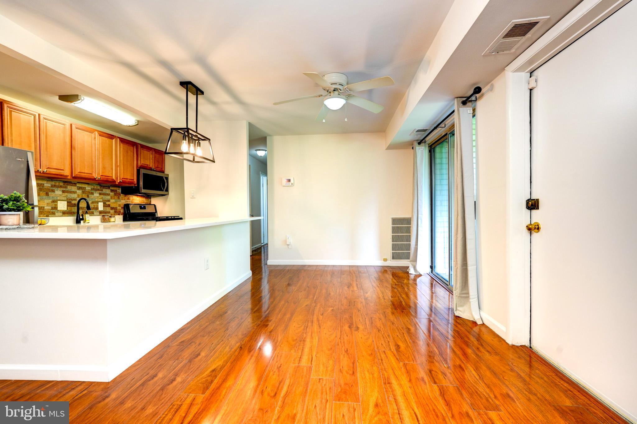 Welcome to this beautifully updated 2-bedroom, 1-bath condo located in the desirable Bethesda Park Condominiums—just minutes from everything Rockville has to offer! This move-in ready home features a fresh, modern look with fresh paint, LVP flooring throughout and a thoughtfully renovated kitchen with sleek new quartz countertops, room for bar stools and a full dining table.
Enjoy the open-concept layout that seamlessly connects your living, dining, and kitchen areas—perfect for relaxing or entertaining. Step outside onto your private patio, which backs to peaceful trees for extra privacy and a touch of nature.
You’ll love the ample storage space, along with the convenient same-level laundry and trash facilities. Plus, all utilities and HVAC are included in the condo fee, making budgeting a breeze.
Ideally located close to Pike & Rose, top-rated grocery stores, restaurants, and shops—with a bus stop, metro station, and major commuter routes in close proximity—this condo offers the perfect blend of comfort and convenience.
Don’t miss this opportunity to own a stylish, low-maintenance home in the heart of Rockville!