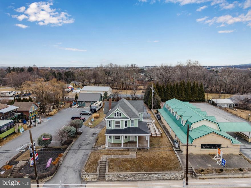Professional office building located along Lincoln Way E (Route 30) in Chambersburg.  This well maintained building provides excellent exposure with daily traffic counts of 17,000+.  The main level features a spacious waiting room, two private offices, half bathroom, and a storage room.  The second floor features a conference room, three private offices, and a full bathroom.  The spacious walk-up attic can handle your filing storage needs.  You will love the intricate wood trim and hardwood flooring.  Parking lot in the rear with +/- 12 spaces.  The handicap entrance ramp eases accessibility for your clients. Convenient location just one mile east of the town square and right off I-81!