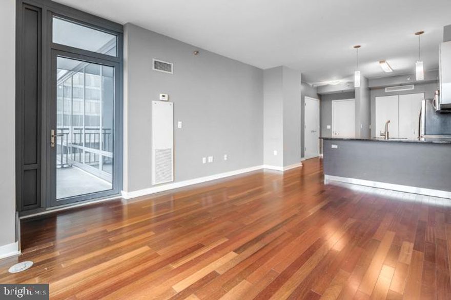 A spacious and luxurious condominium with great North/ West facing views. This 1-bedroom 1-bath residence features modern and luxurious finishes including granite countertops, wood floors, stainless steel appliances, 9 -foot ceilings with floor to ceiling windows. The price includes a reserved parking space in the attached covered garage, and a storage locker. The building features a 24HR Concierge, fitness center, a heated 60FT lap pool, renovated sundeck/community room and much, much more! The building is situated conveniently next door to Trader Joes and Wine & Spirits - and is just walking distance from Philadelphia's top-rated restaurants. Spend the day shopping in Rittenhouse, or enjoying the sights at Boathouse Row, you can't beat the location and attractions located right near the Murano! *Unit pic are from another unit with the same layout/view. Subject property has a higher view*