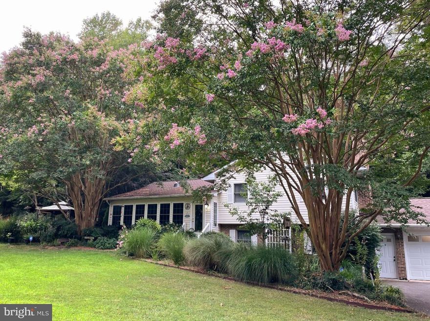 Beautifully Renovated Home with an Open Floorplan in the Well-Established Neighborhood of Esperanza Farms. Enclosed Front Porch a perfect spot for enjoying the array of Birds that live around the property. Bright Kitchen with a Gas Range, Huge Breakfast Bar with Additional Seating and a TON of storage. Large Combined Living Room and Dining Room are perfect for Entertaining. Up a Half Flight of Stairs are Three Lovely Bedrooms and Two Full Bathrooms. Primary Bedroom has a Walk-In Closet designed by California Closets. Half Flight Downstairs boasts a Fourth Bedroom and a Half Bathroom, plus a Cozy Family Room with Wood Burning Fireplace. Laundry Room with Full Size Washer and Dryer Convey. Large Two-Tiered Deck offers plenty of space for Grilling and Al Fresco Dining. Backs to Trees and Offers Plenty of Privacy. Patio wraps around the side of home and overlooks a Perfectly Landscaped One Acre Lot.  Enjoy relaxing in the Inviting Gazebo next an Enchanting Goldfish Pond with Large, Mature Goldfish that Convey! Two Large Sheds Convey. Two Car Garage with Automatic Door Opener, Workbenches and Built-in Shelving. Only Two Minutes from Elementary School, Three Minutes from Shopping/Restaurants/Gym, and Five minutes from Pax River NAS. Community Water Access with Pier and no HOA! Pride in Ownership Shows. A Charming Home.