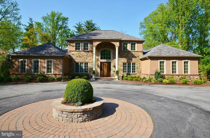 Extraordinary mediterranean style manse with beautifully executed traditional flair.  Klatsky built 6 year young 4 bedroom 5 bath with sensational kitchen, roomy family room and 1st floor master bedroom suite with double dressing areas.  3 bedrooms and 3 baths up and totally finished lower level.  Professionally landscaped private level lot.  CPOUFS.