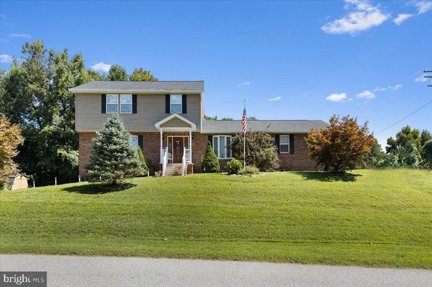 Are you looking a lot of space in the Northern part of Calvert at a very reasonable price tag?  You may have just found it!  This home has a huge living room , beautiful renovated kitchen with granite counter tops and stainless appliances.  Have you always thought the primary bedrooms you have been looking at were too small for you?  Look no further!  This one features a full upper level Primary Bedroom 26' x 19' with two walk in closets and attached bathroom.   The lower level has a full bath and it would be easy to make a 5th bedroom.  There are two driveway entrances giving you extra parking and access to the garage. Not your typical home but there are a lot of great features you can take advantage of.  Close to the beach with all it's activities for fun filled weekends at the farmers market, beach, fishing, restaurants, water park and more!   Only about 35 minutes from  =Joint Base Andrews and the beltway.