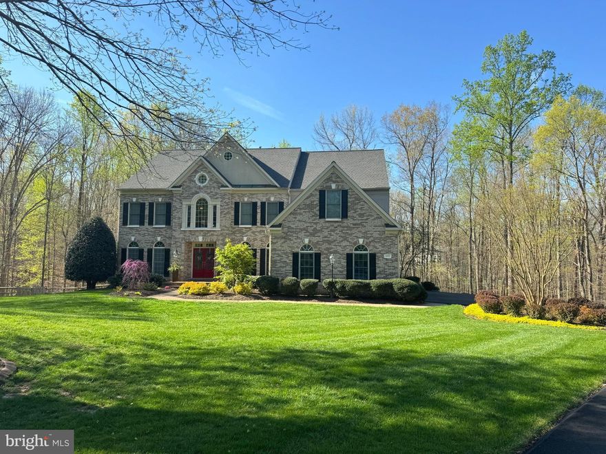 The Estates at Roseland is an exclusive, sought after, private 500-acre community like no other in Fairfax County with homes on 5-acre lots in a heavily wooded, rolling countryside. This GORGEOUS  five bedroom, four and a half bathroom home is nestled on a quiet cul de sac on 5+ acres of wooded land and features over 6,800 square feet of luxury living with a three car attached garage. Enjoy the many recent upgrades and features of this home including all new bathrooms especially the owner's suite spa-like bathroom with heated floor, new trex-like deck with grill covered cooking area, new appliances, newly finished lower walk out level custom bar and wine tasting area and new LVP floors.  There are new light fixtures throughout and updated Legrand wall plates and outlets throughout. These are just a few of the improvements!  Benefit from a newer roof (2019), replaced young systems such as new HVAC, water filtration system, irrigation system  (2022), refinished hardwood floors throughout main level and upper levels, two gas fireplaces, a stone patio, fenced in yard, and massive rear deck. There are two laundry rooms.  The driveway is freshly repaved.  Must see to believe!  Located just minutes to Burke Lake Park, Fountainhead Regional Park, the Town of Occoquan, I-95, the Fairfax County Parkway, and shopping. This unique property is within the outstanding Lake Braddock school pyramid.