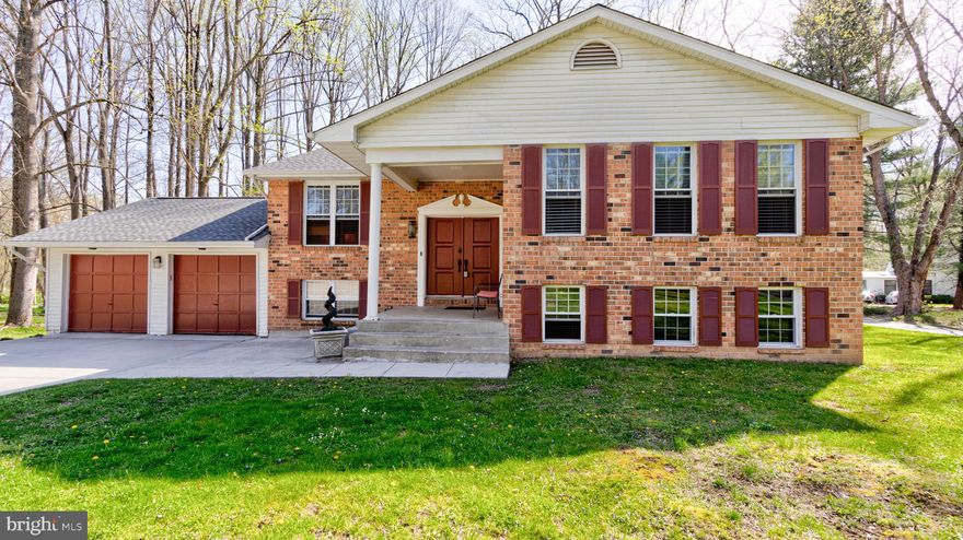 Location, location, location! Large and very spacious 5 bedroom / 3 FULL bathroom custom Ellicott City home in the highly sought after Centennial school district. Spacious living, dining, and entertaining with wooded views, as well as a RARE water view of a branch of the Little Patuxent River directly in your backyard. This house is also located only 1 mile from Centennial Park North. ********offer submission deadline is Wednesday, April 20th at 7pm********

Features a very large rec room with custom sports bar for ultimate relaxation and entertaining. Rec room / sports bar walks out to a newly screened-in patio with mounted TV, LED ceiling lighting, remote controlled LED enclosed ceiling fans, and remote controlled fireplace. Custom wet bar has 2 LARGE granite countertops, sink, 2 built-in refrigerators, mounted TV, and plenty of cabinets. Rec room also features a home theater with 3D TV, 7-channel surround with recessed ceiling surround speakers, 9 motorized reclining theater chairs with LED lights, USB ports, and cup holders, carpeted platform with LED lights around base, motorized blackout shades, air hockey / pool / table tennis combo gaming table, and cozy 60,000 BTU Enviro MAXX pellet stove with 130 pound hopper that effortlessly heats the entire home.

The theater, bar, arcade, and patio TVs are all wirelessly synced to the same audio/video source to create a true sports bar experience.

The house has a new roof, large and freshly stained deck, new hot water heater, recently serviced HVAC system, custom pavers and stone around house, Philips Hue smart bulbs installed in living room, rec room, and exterior light sockets, new ceiling fans in bedrooms, dimming light switches throughout, updated light fixtures throughout, Vivint smart alarm system with 5 wireless cameras and front door keypad, smart garage door openers, updated kitchen with solid natural oak cabinets, granite countertops, stainless steel stove, microwave and refrigerator, recently purchased Whirlpool washer and dryer, granite countertops in all 3 bathrooms, beautiful hardwood floors on upper level, new carpet in upper level bedrooms, and ceramic tile in kitchen, bathrooms, foyer, and rec room.

Parking includes a two-car garage, in addition to a long, widened driveway.

Store your important items in the finished, hidden room under the staircase with electronic doorknob.

Also, there are almost 6 years remaining on the Select Home Warranty balance. The contract end date is February 2, 2028.

Platinum Care Coverage Includes:
Plumbing Stoppage, Plumbing System, Dishwasher, Clothes Washer, Clothes Dryer, Refrigerator, Heating System, Stove/Oven, Ductwork, Water Heater, Microwave Oven(Built In), Garage Door Opener, Garbage Disposal, Cooktop, A/C Cooling, Electrical System, Ceiling Fan and Optional Roof Leak Coverage

The list goes on and on for reasons why you should purchase this home. Come see it for yourself. This gem won't be on the market long!