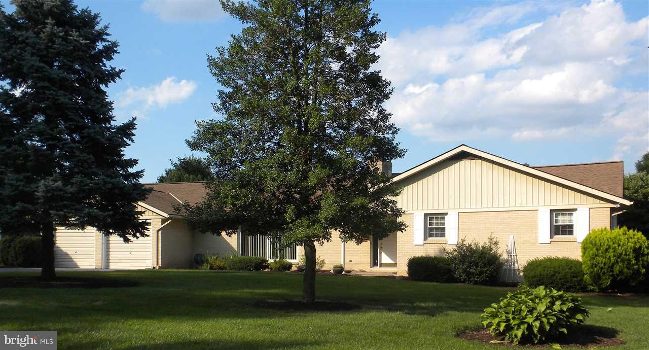 Well Maintained RANCH HOME-- Featuring Hardwood Floors, 2 Fireplaces, Natural Light Throughout, 1st Floor Laundry, M/ Bedroom w/ M/Bath, Walk-up Lower Level under entire Home. Newer Furnace and Roof, 2 Water Htrs, Sunroom w/ Heat and A/C, which leads to a Rear Patio and Yard extending onto the Private Golf Course for you to enjoy the majestic view