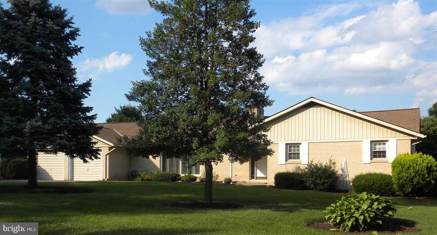 Well Maintained RANCH HOME-- Featuring Hardwood Floors, 2 Fireplaces, Natural   Light Throughout, 1st Floor Laundry, M/ Bedroom w/ M/Bath, Walk-up Lower   Level under entire Home. Newer Furnace and Roof, 2 Water Htrs, Sunroom w/   Heat and A/C, which leads to a  Rear Patio and Yard extending onto the   Private Golf Course for you to enjoy the majestic view
