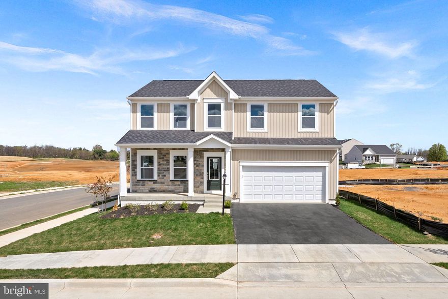 MOVE IN READY Dallas floor plan on a premium corner homesite in Huntwell West! This beautifully designed home features partial stone exterior and a welcoming front porch, offering fantastic curb appeal.

Inside, the kitchen is a chef’s dream, complete with a large island, quartz countertops, stainless steel appliances, and luxury vinyl plank flooring. The sunroom leads to a spacious 10' x 18' deck, perfect for outdoor entertaining. The family room boasts a cozy fireplace, while extra lighting in every room enhances the home’s bright and inviting feel.

A flex room on the main level provides versatility for an office or playroom. Upstairs, you’ll find four spacious bedrooms, including a primary suite with a luxurious soaking tub. The finished basement adds additional living space, complete with a half bath.

Situated on a desirable corner lot, this home offers ample yard space and great outdoor potential. Don’t miss your chance to own this move-in ready gem!

Schedule your tour today!

Photos shown are of a similar home and for inspiration purposes only. 

For more details or to schedule a private tour, contact our Neighborhood Sales Representative today. Visit our model home at 11 Peters Ave, Ranson, WV, and take the first step toward building your dream home!