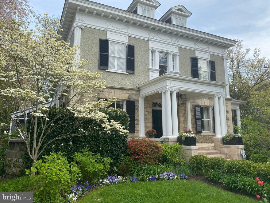 Gorgeous Cleveland Park home  with beautiful architecture throughout! Set back from the street with  private yard around the house and beautiful landscaping.   This 5 Bedroom home has large entertaining rooms, a renovated sun-filled Kitchen, charming screened in porch, master suite complete with beautiful master bath and master office. The Lower level features a large bar,  family room, laundry room, renovated full bath and closet space. 3 car parking in rear driveway complete with electric car hook up!