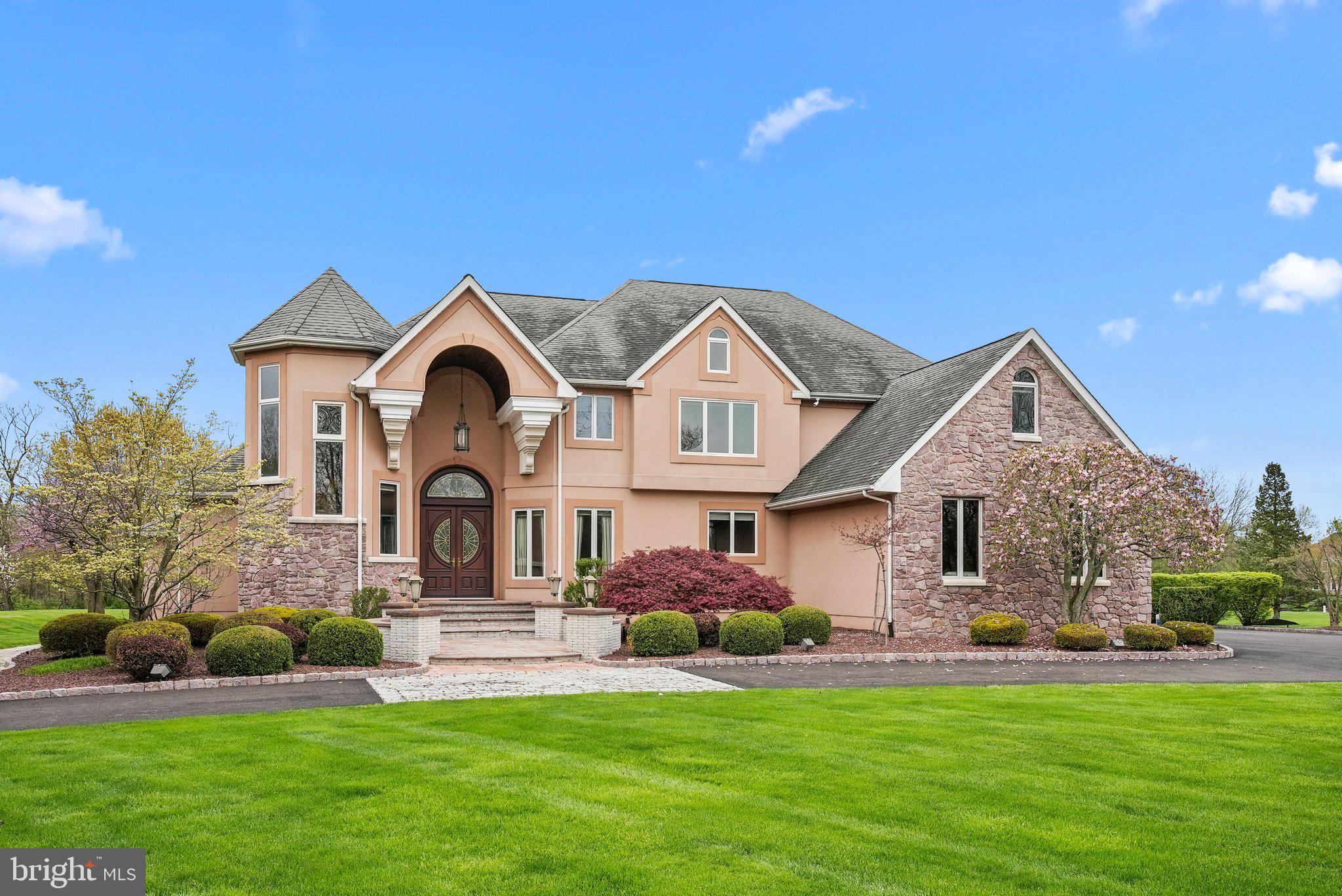 Welcome to the epitome of luxury living in this prestigious Upper Makefield enclave! Nestled within this exclusive community, this magnificent custom-built home offers an unparalleled blend of elegance, comfort, and sophistication. Boasting an impressive facade and impeccable craftsmanship, this residence immediately captivates with its grandeur. Step inside to the grand 2 story foyer that flows seemlessly into the formal living room and dining room. The heart of the home is undoubtedly the gourmet kitchen, a culinary masterpiece featuring high-end appliances and imported Italian cabinetry. The large island features granite countertops, a wine refrigerator and a 5 burner Wolf gas propane cooktop. Other features include double wall ovens, a built in microwave and a built in sub zero refrigerator. The kitchen is open to the family room and the expansive additional dining space/sitting room that offers an abundance of windows and heated granite flooring . From this area, you can step outside to the breathtaking paver patio, a true outdoor paradise where alfresco living reaches new heights. Entertain effortlessly in the outdoor kitchen, complete with all the amenities needed to whip up gourmet meals while enjoying the picturesque surroundings. The main floor also features a home office and a laundry room. The second level includes the expansive primary suite, where you can unwind at the end of the day. The ensuite bathroom features a large Jacuzzi soaking tub, a steam shower and a large double vanity. Also on this floor, you'll find 3 additional bedrooms, a large bonus room and the full main bath. The walk up finished attic provides space for another bedroom, office, craft room, art studio.....the possibilities are endless! Head down to the walkout basement and you'll find another full bathroom, a large finished space with porcelain tile flooring and an exercise room. There is also an ample amount of storage. Other features of this fabulous home include a 3 car garage and a huge circular driveway. The whole house generator provides peace of mind in the event of a power loss. Located in the highly sought-after Council Rock school district, and surrounded by lush greenery and scenic vistas, this home offers the perfect combination of privacy and convenience. Make your appointment to see this gorgeous home today!