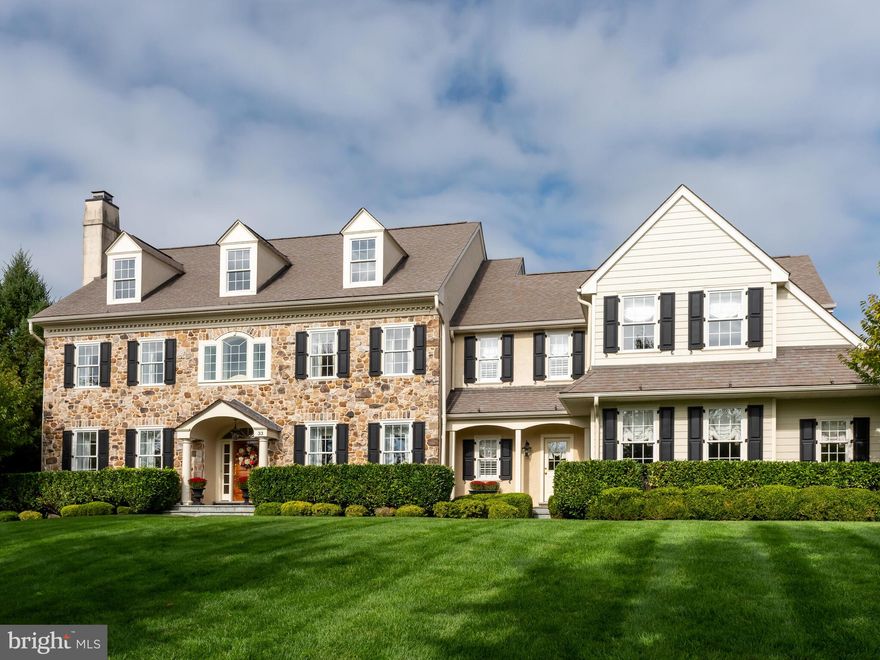 Situated on a cul-de-sac within the “Edgehill” neighborhood, the Burberry II model at 33 Edgehill Lane in Collegeville, built by Bentley Homes in 2009, is an exquisite estate on one acre of professionally landscaped land. This 5-bedroom, 3 full 2 half bath home, is a haven of luxury, which the original owners have enhanced with over $700,000 in meticulous upgrades. The exterior boasts  Natural Stone masonry, composite siding and stucco and over 70 premium Anderson windows. The property features an underground  irrigation system, bluestone walkways, porches, and a rear patio with landscape lighting, all designed to showcase its grandeur. Upon entering through the 42-inch wide mahogany front door, you are greeted by a dramatic center hall entryway that opens into a grand 2-story reception hall with hardwood floors. The first floor unfolds into a tapestry of luxury, beginning with the living room's 9'8" ceiling height, leading to the study and dining room. The Dining room is large enough to comfortably accommodate a twelve-chair dining table. The custom kitchen serves as the heart of the home, featuring custom marble countertops and backsplash, 55-inch high cherry cabinets with glass upper doors, a Wolf 6-burner stove with built-in griddle, a double door Subzero refrigerator, and high-end GE Monogram double ovens. The adjoining butler's pantry with a wet bar enhances your entertaining experience. Beyond the kitchen, the family room impresses with a 14' high cathedral ceiling and a gas fireplace with a natural stone surround, while the breakfast room offers a cozy space under an 11' high tray ceiling. Ascend the open staircase, with its upgraded balusters and banister, to the second floor where the opulence continues. The master suite, with a 9' high tray ceiling, includes a sitting room and is complemented by his and hers walk-in closets and a luxurious bath with upgraded tiles, twin vanities, soaking tub with whirlpool jets, glass stall shower doors and a private water closet.  This level features four additional large bedrooms, and two more full baths, alongside a second-floor laundry room. Descending the open stairway from the main level to the fully insulated basement, you'll find a vast space with 9 feet ceilings, ready for your finishing touches adds a layer of potential for entertainment or additional living areas. Completing this magnificent home is an over-sized, fully insulated three-car garage, with room for all your vehicles and storage needs. 33 Edgehill Lane also includes extensive upgrades such as six-inch thick exterior walls, high-efficient four-zone heating and cooling systems, an extensive house alarm system, 75 gallon hot water heater, engineered flooring system, Generac Guardian 22kw whole house backup electrical generator, and more. This home is a testament to luxury and elegance, ready to welcome discerning residents who appreciate attention to detail. Located just minutes from Rt 422, the Collegeville Providence Shopping Center, and the bustling scene of downtown Phoenixville, it offers both convenience and grandeur. Welcome home…