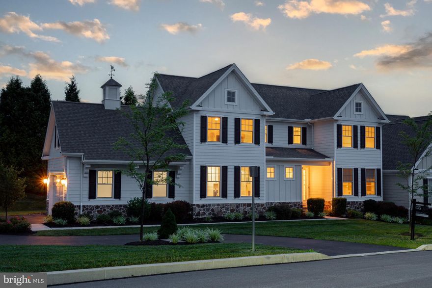 Welcome to 3 Radnor Lane, a fully furnished home featuring a luxurious first-floor primary bedroom suite and high-end finishes throughout.  Available for immediate occupancy! Built in 2021, this stunning custom Haddon model is situated on a premium lot with no neighbors to the rear or side, offering unparalleled privacy rarely found in the area. With its side-load 2-car garage, ample driveway parking, and custom architectural details like a cupola and weathervane, this home combines the style and function of a single-family house with the convenience of low-maintenance living. Inside, the expanded footprint creates additional space where you need it most. The open floor plan flows seamlessly and is perfect for entertaining. Featuring engineered hardwood floors, custom blinds, coffered ceilings, recessed lighting, built-ins, and recently installed Closets by Design organizers. The chef-inspired kitchen is a true centerpiece, featuring a Wi-Fi-enabled JennAir® RISE™ appliance package that includes a six-burner gas range oven, electric wall oven/microwave, dishwasher, and refrigerator. Shaker-style soft-close cabinetry, quartz countertops, sealed cast iron sink,  beverage refrigerator, tile backsplash, walk-in pantry, and a massive island with seating for four round out this luxurious kitchen. The main-level primary suite serves as a private retreat, with large windows for natural light, dual walk-in closets, and a luxurious en suite bath. Upstairs, you’ll find two generously sized bedrooms, a loft space with an expansive built-in bookshelf, and a hall bath. The finished lower level is equally impressive, boasting a spacious family room with a kitchenette, a large bedroom with a walk-in closet that connects to a full bath, and a second washer and dryer. An unfinished area provides ample storage and includes a built-in workshop. Outdoor living is equally inviting, with an expanded rear deck perfect for entertaining or relaxing. Additional features include energy-efficient two-zone Wi-Fi-enabled HVAC and smart home technology throughout. The Villages at Northridge offers a serene community with open spaces, sidewalks, and trails connecting to Longwood Preserve. Located near vibrant Kennett Square Borough, Delaware, and West Chester, you'll enjoy easy access to Longwood Gardens, Anson Nixon Park, and Kennett Square Country Club—all with low HOA fees. This home is truly one of a kind and offers unbeatable value. Schedule your showing today before it’s gone!