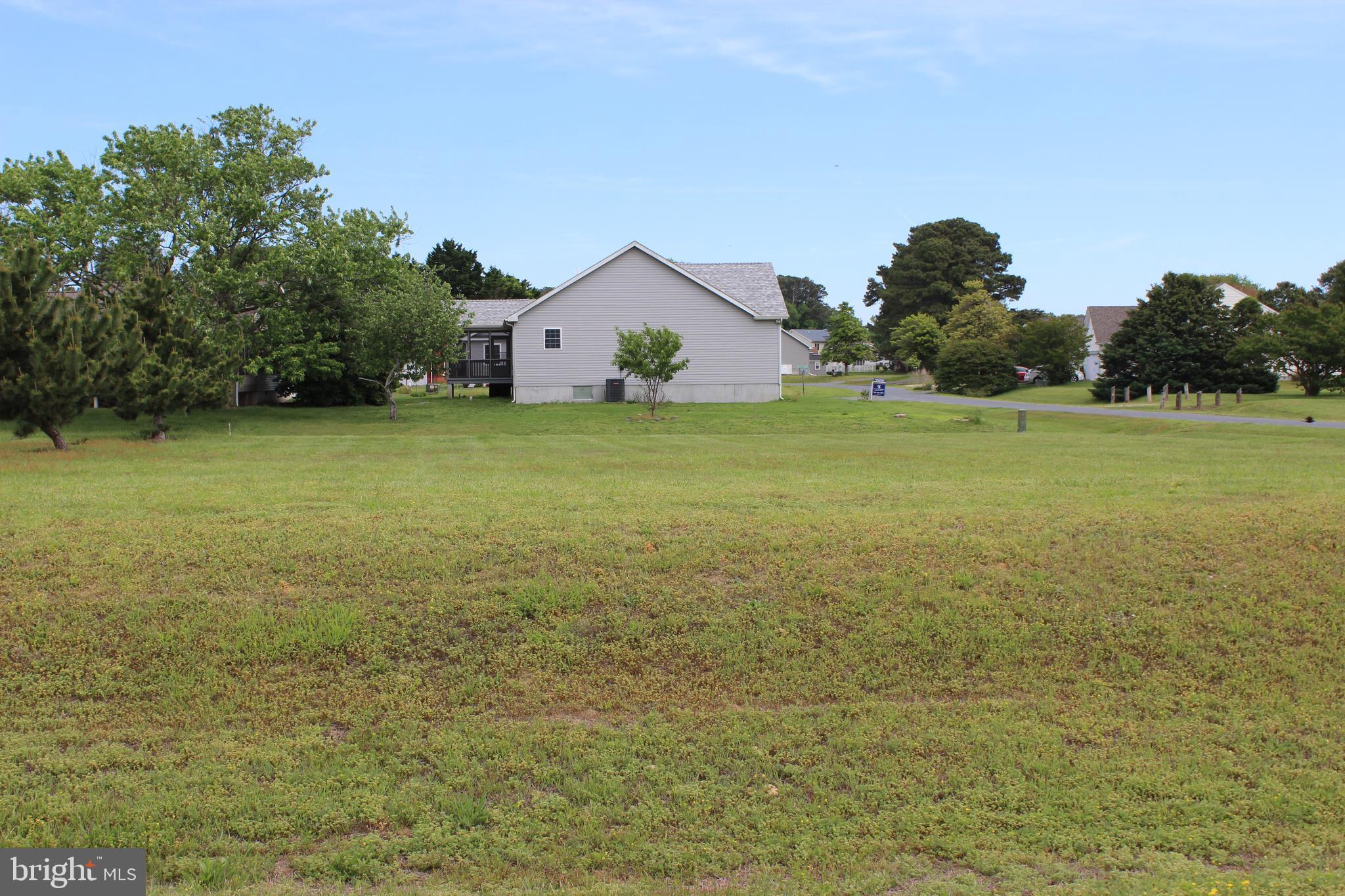 9/43 Oversized, cleared corner lot (13,575 sq. ft.) located in Captains Cove. Lot has 4BR Cert letter on file and has water availability. Buy now and build later, take advantage of this great buy! No time frame to build, No builder tie-in. Cleared lot saves you money on lot clearing and a corner lot offers additional building options. Relax and enjoy all the amenities and the lifestyle on the Eastern Shore of VA. Captains Cove is the Eastern Shore of Virginia's fastest growing Golf & Waterfront community; close to Chincoteague Island, Wallops Island and Ocean City MD. HOA amenities: Pristine 9 Hole Golf Course, indoor/outdoor pools (2), fitness center, basketball, tennis & pickle-ball courts, boat ramp, Biking & walking trails, playground, picnic area, security and so much more.