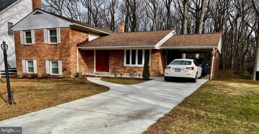 Welcome to this well maintained cul-de-sac charmer, proudly enjoyed by the same owners for 40 years. This spacious 4-level split offers 4–5 bedrooms and 3 full bathrooms, providing versatility for today’s living needs. A gleaming stone foyer invites you inside, where hardwood and tile flooring flow seamlessly through the main level. The bright and open living room leads just three steps down to a warm and inviting sitting area featuring a cozy wood-burning stove, perfect for chilly evenings.

The kitchen boasts ceramic tile floors and sleek stainless-steel appliances. The lower level offers exceptional flexibility, including a rear entrance, full bathroom, and a potential 5th bedroom, ideal for guests, extended family, or an independent living space.

Enjoy peace of mind with major recent upgrades: new roof (2025), carport (2024), front sidewalk (2024), redesigned front porch (2024), refinished hardwood floors on the main and upper levels (2025), new carpet in family room (2025), and washer/dryer (2018). Abundant storage throughout the home adds even more convenience.

Step outside to your deck and private yard, an entertainer’s dream with plenty of room for gatherings, gardening, or relaxing under the trees.

The location is unbeatable! You’re just a short walk from the park, community center, and fitness center, making everyday living effortless and enjoyable.

Don’t miss your chance to own this exceptional, lovingly cared-for home that truly has it all!
