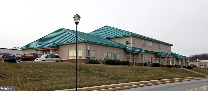This commercial lease opportunity is situated within a well-established business park in the four county area of Mount Airy MD, offering a strategic location that fosters professional growth and collaboration. The property, constructed in 2005, features durable block, concrete, metal siding, bathroom, office with front door access, mezzanine for storage, and a large warehouse with overhead bay door. The surrounding mixed-use neighborhood is characterized by a vibrant community atmosphere, with access to essential public services and amenities.  The business park is conveniently located, facilitating efficient transportation and connectivity to major thoroughfares of I-70, Routes 27 and 26. This property is available for lease with a term of 60 months, presenting an ideal opportunity for businesses seeking a professional setting in a thriving locale.