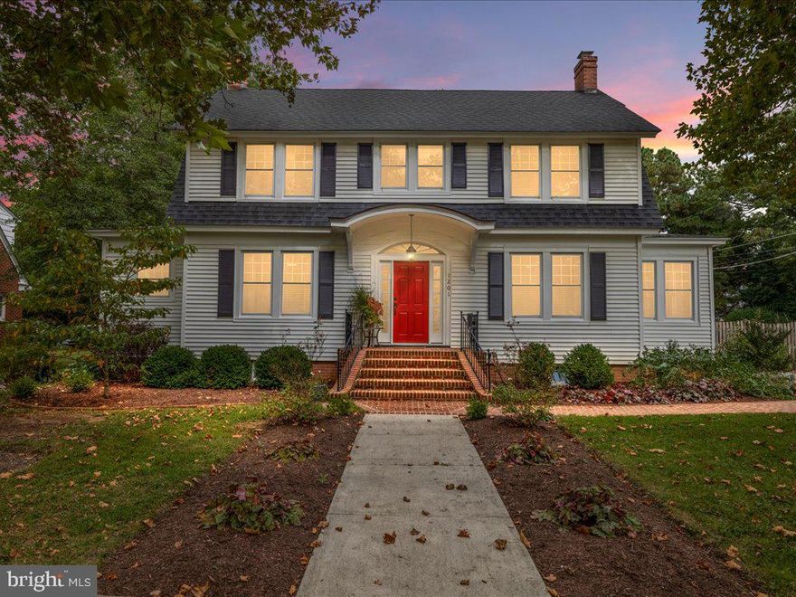 Seller will entertain back up offers.  Charming Colonial Home in Cambridge, MD – 1201 Hambrooks Blvd 
Discover the perfect blend of historic charm and modern updates at this meticulously maintained 3-bedroom, 2.5-bath Colonial home, nestled in the heart of Cambridge and near the water’s edge of the Choptank River. 
Upon arrival, you’re greeted by a classic red front door framed by the inviting brick front steps and an elegant arched portico. Step inside to a sun-filled foyer where original hardwood floors flow throughout the main level. The spacious living areas feature arched entryways and exposed brick that exude character and warmth. 
The living room, complete with a double window that overlooks the sycamore-lined street, is next to the first-floor laundry and convenient closet. Across the foyer is the open kitchen and dining area with a cozy brick fireplace. The fully updated kitchen showcases gleaming cream cabinetry, glass accent cabinets, quartz countertops, stainless steel appliances including a gas range, and an island perfect for meal prep. The kitchen’s modern fixtures, ample storage and counter space make it a standout feature of this home. Off of the kitchen is a special nook that invites lots of sunlight and is a perfect quiet space to have your morning coffee or read your favorite book. 
To the rear of the first floor are two additional rooms and a half bathroom. These spaces have previously been used for a music studio, TV room, home office and extra sleeping space for visitors.
Upstairs, three generously-sized carpeted bedrooms offer peaceful retreats with plenty of natural light and some glimpses of the river. The primary suite includes a walk-in closet and a spacious en-suite with separate vanities. The two additional bedrooms share a full bath with modern fixtures. Above the hallway, an encapsulated, floored attic provides extensive storage. 
Outdoors, enjoy your private backyard oasis. The composite deck, with its pergola overhead, is ideal for hosting summer barbecues or simply enjoying the serene surroundings. The fenced yard provides ample space for gardening, play, or pets. Both the native plant garden in the back yard as well as the rain garden in the front yard provide unique, beautiful environment-friendly touches. 
The building in the back of the lot includes a detached one and a half car garage and a ground-level, one-bedroom apartment with its own private entrance, making it ideal for extended family stays, a home office, or as a potential rental unit to generate additional income. The apartment has a kitchenette, cozy living area, and a full bath, creating a comfortable, self-contained living space separate from the main home. With its distinct entrance and proximity to the main house, this unique addition enhances both the property’s functionality and investment potential.  
Additional features of this home include two-zoned central air conditioning, a full basement and fabulous nearby amenities — Gerry Boyle Great Marsh Park (playground, boat ramp, events), YMCA, city boat dock, Choptank Lighthouse, downtown restaurants, arts center, and shops are all within 1 mile.  Schedule your showing today and imagine the possibilities of life at 1201 Hambrooks Blvd.