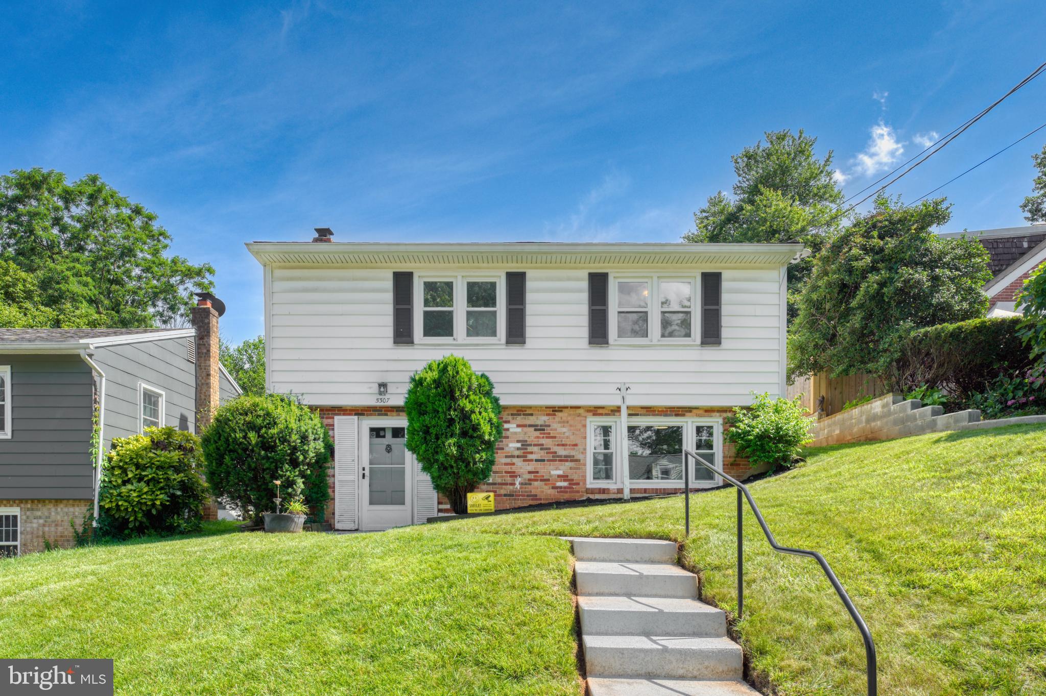 Welcome to 5307 Upshur St – a lovingly maintained 3-bedroom, 1-bath home offering warmth, character, and functional living in a convenient Bladensburg location. Freshly painted and featuring brand-new carpet on the main level, this home is move-in ready and full of inviting charm. As you enter, you’re welcomed by a spacious family room with windows that fill the space with natural light. A cozy fireplace serves as the centerpiece, creating a comfortable setting for relaxing or entertaining guests. Upstairs, the main living area includes a bright living room, a tidy and well-cared-for kitchen, and a dining area perfect for everyday meals or casual gatherings. Just off the dining space, step onto a concrete deck—an ideal spot for enjoying your morning coffee or unwinding in the evening. The deck leads to a generous backyard with plenty of room for outdoor activities, gardening, or entertaining. Two comfortable bedrooms and a full bathroom complete the upper level. In the backyard, you'll find two well-maintained sheds that offer excellent storage options or potential for additional functional space. One of the sheds is equipped with a window A/C unit, making it a great candidate for a workshop, studio, or hobby room. With its fresh interior updates, flexible outdoor space, and unique extras, 5307 Upshur St offers a perfect blend of comfort, practicality, and possibility. Schedule your private tour today! ACT FAST, WILL NOT LAST!