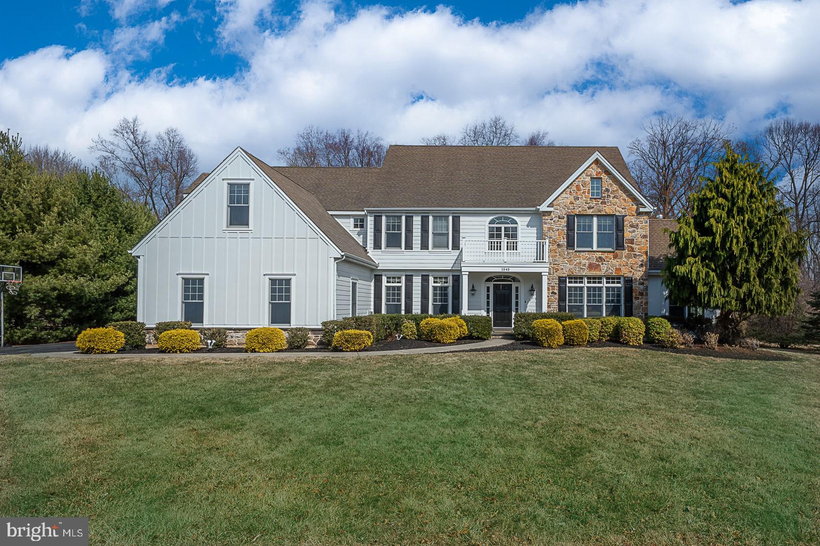 Welcome to this exquisite 6,582 square foot home nestled on a beautiful 1.31-acre lot in the highly sought-after Great Valley School District. This impressive 6-bedroom, 4 full and 2 half-bathroom home offers luxurious living spaces both inside and out, with stunning views of the serene wooded area behind the property. Upon entry, you are greeted by a grand 2-story foyer that leads into the formal living room, featuring hardwood floors that flow throughout the 1st floor, crown molding and a cozy fireplace perfect for relaxing. The formal dining room with crown molding and chair rail offers an elegant space for hosting dinner parties. The spacious eat-in kitchen is a chef's dream, boasting granite countertops, a large island, pantry and breakfast area with sliding doors leading to the expansive back Trex deck — ideal for outdoor dining and entertaining. The oversized family room, complete with its own fireplace and hard-wired surround sound system flows seamlessly off the kitchen, making it the perfect place for family gatherings. A 4 season sunroom with vaulted ceilings and breathtaking views of the backyard provides the perfect spot to unwind and enjoy nature. Rounding out this level, is an office, 2 half baths and mudroom. Ascend the stairs to the 2nd floor to the expansive primary suite, complete with a private sitting room, large walk-in closet, and a luxurious full bath with double vanity, jacuzzi tub and separate shower. Four additional generously-sized bedrooms, one with an full ensuite bath and a full hall bathroom ensure ample space for family and guests. Convenient 2nd floor laundry completes this level. The finished lower level offers tons of additional living space, featuring multiple recreation rooms, a bedroom, and a full bath — perfect for a home theater, gym, or in-law suite. Intercom system throughout home. Brand new Hardy Board was completed on entire home. This home also boasts a 3-car garage and is set on a beautifully landscaped, interior lot, offering both privacy and tranquility. Don’t miss the opportunity to make this dream home yours! Schedule a tour today!