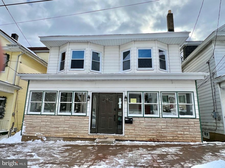 Take a look at this remodeled home in Shenandoah Heights. There is nothing to do but move in and enjoy! All work was done within the last two years - new roof, wiring, heating, flooring and more! Beautiful hardwood floors on the main level. Nice, high ceilings with beautiful light fixtures.  Drywall throughout the home. The first floor offers a huge living room, a bonus room and a large, modern kitchen. The second floor has four nice sized bedrooms, a walk-in closet and a modern bathroom. The third floor has a finished fifth bedroom and a storage room. The basement is large with high ceilings and a bathroom. There is a maintenance free deck off the kitchen that leads to the large, fenced back yard.