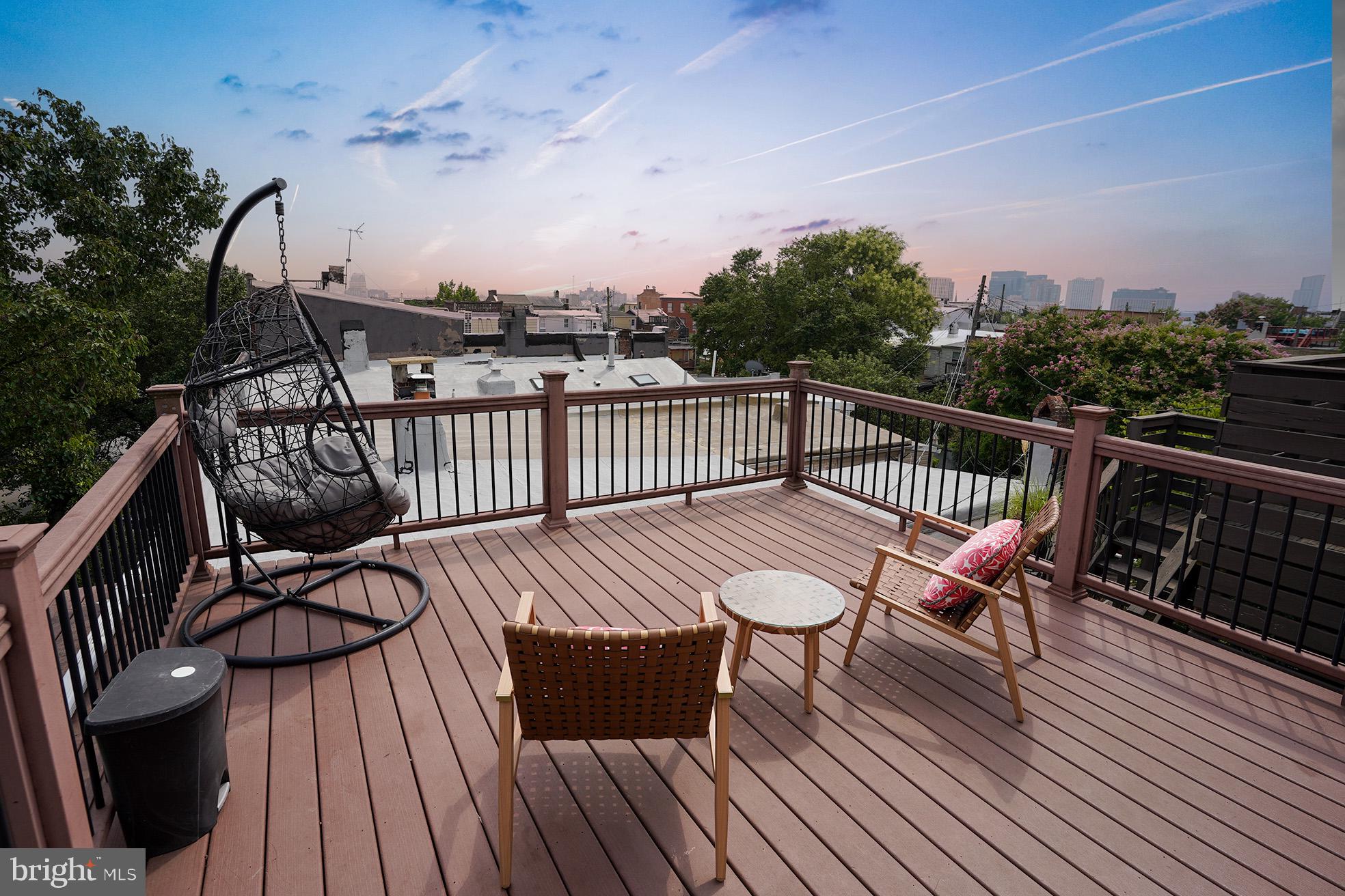 Beautifully Designed End-of-Group Rowhome with Rooftop Deck & 3 Finished Levels!
Offering over 2,300 sq. ft. of living space, this stunning home features an open floor plan with a spacious living and dining area accented by hardwood floors, crown molding, and a cozy fireplace. The gourmet island kitchen boasts stainless steel appliances, granite countertops, and a stylish tile backsplash. The second level includes 2 bedrooms, 2 full baths, and convenient bedroom-level laundry. The entire third level is a private owner’s retreat with exposed brick walls, a separate sitting room, and a luxurious spa bath with a whirlpool tub and separate shower. Enjoy sweeping city views from the 3rd floor deck! Perfectly located near Patterson Park, Johns Hopkins, Fells Point, and Harbor East.