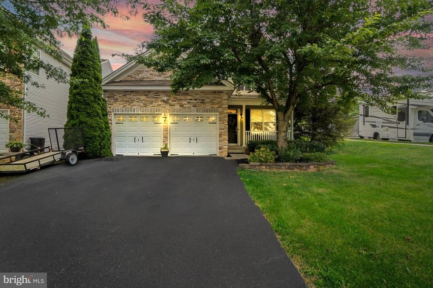 Welcome to this beautifully updated 4 bedroom, 2.5 bath Colonial that offers comfort, space, and modern upgrades throughout. Enjoy efficient gas heat, Central A/C, and hardwood flooring that flows through the first floor. The kitchen is a chef’s dream with all stainless steel appliances, a 5-burner gas stove, granite countertops, and ample cabinet space. Cozy up by the fireplace in the inviting family room just off the kitchen. Upstairs, the spacious primary suite features cathedral ceilings, two closets, a private sitting area with its own fireplace, and a luxurious en suite bath with dual vanities. Three additional bedrooms, a full hallway bath, and convenient second-floor laundry complete the upper level. The finished basement is perfect for entertaining, offering a large recreation/family room and a full sit-up wet bar with butcherblock counters. Step outside to a lovely covered patio—ideal for relaxing or entertaining in your backyard oasis. This home checks all the boxes—schedule your showing today!