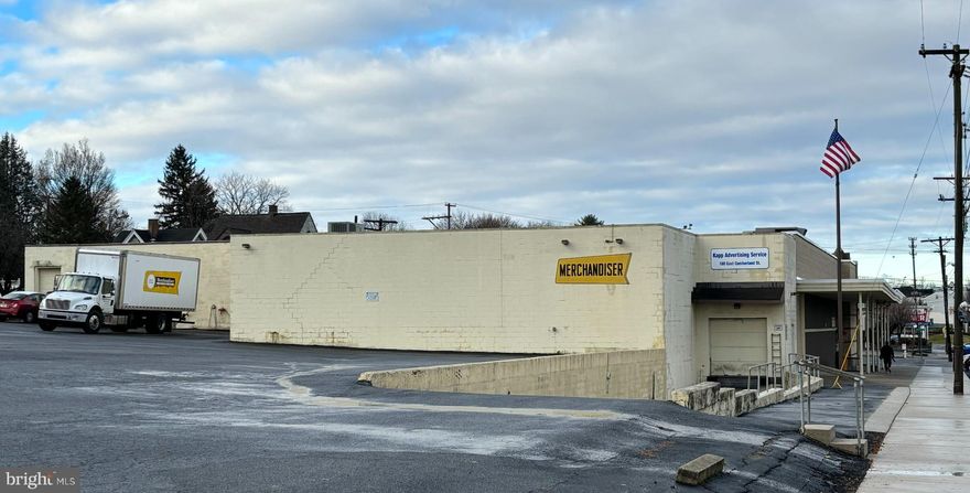 Located at 100 E. Cumberland St., Lebanon, PA, this iconic property has been the home of the Merchandiser and Kapp Advertising Service Inc. since 1990. Consisting of +/- 26,000 SF of industrial and office space on approximately 1.4 acres. The General Industrial Commercial zoning is a developer’s dream, with potential for a wide variety of uses in addition to the current manufacturing use including multifamily conversion, retail, financial and institutional uses and much more. Additionally, the premises features central air throughout the offices, ensuring a comfortable work environment. The warehouse is equipped with heating, and there is a loading dock and 5 drive-in doors for convenient operations. Ample parking is available to accommodate employees and visitors.