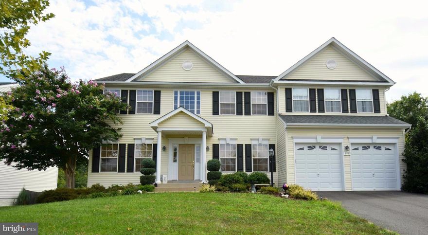 Spectacular large 5 bedroom, 3.5 bath single family home w/upgrades incl. gourmet kitchen w/center island w/cooktop, double wall ovens, built-in microwave, & granite counters, Separate office/study on main level & extra large family room w/gas fireplace.  5  bedrooms & 3 full baths on upper level.  Large level lot with space to add a pool or entertain. Private oasis backs to trees/woods!!!