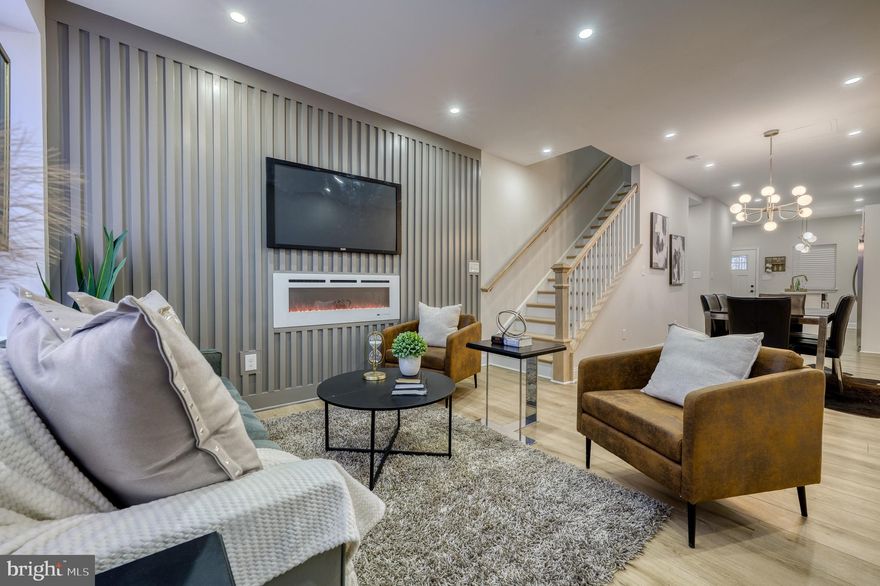 Welcome to 2915 Walbrook Avenue, a beautifully updated residence that effortlessly blends modern elegance with timeless charm. This fully remodeled gem boasts high-end finishes and thoughtful touches throughout, making it a true standout in the area.  Step inside to find a spacious living room featuring a sleek electric fireplace—perfect for cozy evenings—and gleaming floors that exude warmth and sophistication. The heart of the home is the gourmet kitchen, where stainless steel appliances, a center island with upgraded countertops, and ample cabinetry set the stage for culinary creations and gatherings alike.  Retreat to the luxurious primary bedroom, complete with its own electric fireplace, and a breathtaking spa like bathroom creating a serene sanctuary you’ll never want to leave. The home also offers a fully finished basement with a full bath on the lower level— ideal for entertaining, a home office, or  guest accommodations. Buyer to confirm if use fits their needs prior to submitting an offer. This home combines modern amenities with unbeatable value. Don't miss your opportunity to own this move-in-ready masterpiece. Tons of grants available based on buyer eligibility. —schedule your showing today!