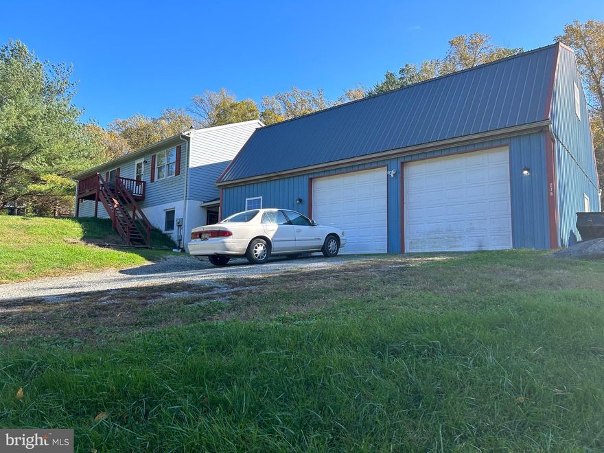 Welcome home! A raised rancher priced below appraised value that offers the perfect blend of comfort & seclusion.  This 2br home can be reverted back to the original 3br layout. Main level features an eat in kitchen with access to the deck and fenced in portion of yard, cozy living area, an extra large master bedroom with its own full bath, second bedroom  fb, full bath in hallway and laundry hook up. The lower level offers the potential to be used as an in-law suite with a large entry way, 2 finished rooms, a kitchenette, full bath and it's own ground level entrance. Outside you can’t miss the oversized 2 bay garage with loft as well as shed with electric. Sitting on 1.27 acres, the possibilities are endless!