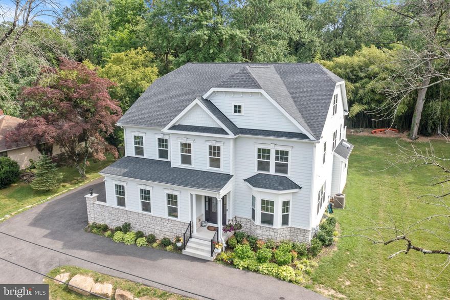 Built in 2021, this spectacular 4 bedroom, 2.1 bathroom home has been carefully curated to blend the crisp lines of modern homes with the classic beauty of traditional Main Line estates. With a beautiful exterior featuring a combination of Hardy board and white stone. The large wood-burning fireplace is enhanced with this white stone. This home exudes elegance and charm. The two-car attached garage provides convenience and additional storage space.
The chefs kitchen is equipped with everything you want and all kitchen appliances are under warranty until 2025.
The property has a half moon driveway, two entrances and two exits for easy access an eight car capacity for parking for your guests. 

Step inside this exquisite home and be greeted by a spacious, bright, and open floor plan. The two-story entrance sets a grand tone, showcasing the attention to detail throughout. This home is filled with desirable features, including oak wood flooring, 10’ ceilings, recessed lighting, and ceiling fans throughout. Stereo ceiling speakers are installed on the 1st and 2nd floors and the 3rd floor is also hard-wired for the ceiling speakers. This is a fantastic audio experience throughout the home. The wide baseboards, crown molding, and ceiling molding add a touch of sophistication to every room. The expansive dining room is perfect for hosting gatherings and creating lasting memories. Multiple closets throughout the home provide ample storage space, and the powder room boasts a waterfall faucet with a round glass bowl, adding a touch of luxury.

The kitchen is a chef's dream, with two sets of sliding glass doors leading to the yard, allowing natural light to flood the space. Equipped with GE Cafe appliances and a built-in wall oven and microwave, this kitchen is ready for all your culinary adventures. The Cafe refrigerator features an extra door with sensors for added convenience. A 48" Bluestar gas range with 8 burners and double ovens takes center stage. Century white cabinetry, a Kraus prep sink, and a Kraus Deep sink in the island are just a few of the highlights. The Cambria quartz oversized island, measuring 9'9"x4'3", is perfect for gathering around with family and friends. A walk-in pantry provides ample storage space for all your kitchen essentials. The bright and oversized breakfast area features extra-large windows, creating a delightful atmosphere for entertaining. Tall windows with deep sills further enhance the aesthetic appeal.

The primary bedroom is a true retreat, offering access to a private balcony, perfect for enjoying your morning coffee or relaxing in the evenings. The main marble bathroom is luxurious, featuring an extra-large soaking tub, a separate water closet, and a double vanity. The oversized shower with a rain head adds a spa-like touch. Two walk-in closets, along with an additional closet, provide ample storage for all your belongings. In addition to the 2 walk-in closets in the primary suite, 2 other bedrooms also feature walk-in closets and ceiling fans, ensuring comfort and convenience. The laundry room on the second floor is large and accommodating, equipped with double sinks for added functionality. The third floor is an open, finished floor that can be utilized for a variety of purposes, such as a bedroom, playroom, or office. The lower level is unfinished, offering 8'8" ceilings and an exciting opportunity to customize the space to your liking. 


The expansive backyard is a blank canvas for you to create the outdoor oasis of your dreams and conveniently backs up to the Radnor Trail. Located in Radnor Township School District, residents of this home enjoy the close proximity and to the abundance of shops and restaurants that downtown Wayne has to offer just 1 mile away including White Dog Cafe, Great American Pub, and The Goat’s Beard. Situated close to public transportation, Route 30, and I-476, commuting from this home is a breeze!