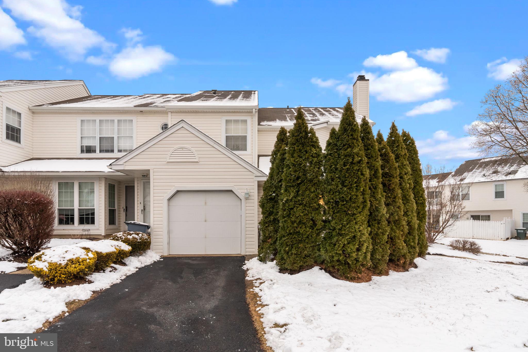 There's no place like Hamlet! Welcome to 38 Banbury Court, a 2 BD/1.5 BA corner townhome offering privacy, convenience, and community in Village Shires. This floor plan is as practical as it is contemporary, offering an updated kitchen, open floor plan, hardwood flooring, and an attached garage (with interior access). The first floor features a custom kitchen with granite countertops, plentiful storage, stainless steel appliances, and sliding glass doors that open to your patio, enclosed by mature arborvitae; off the kitchen is your dining and living area that share a view of the wood-burning fireplace. The bright windows invite natural light in, creating an atmosphere that’s as warm as it is welcoming. A convenient powder room completes the first floor. The second floor features two spacious bedrooms, a jack-and-jill hall bath, and a dedicated laundry closet. The primary bedroom optimizes for ease thanks to the walk-in closet and en-suite access to the hall bathroom. The second bedroom optimizes for versatility - make it a kid's bed, guest bed, home office, or combination of the three! Located on a private, peaceful street with quick access to local parks, shopping, and restaurants. Whether you're in the mood for a coffee from Nourish Cafe, nachos and margs at El Barrio Cantina, or a slice of Italian paradise (er, pizza) at Aldo's, you're steps away from the area's best watering holes. You also have a bucolic walk through Tyler State Park or a stroll down Newtown's State Street within an 8-minute radius (really - we mapped it)! In the summer months, Village Shires homeowners have access to the tennis courts and three (3) pools. Who needs to go to the Hamptons when you live in Hamlet? Also included in the HOA is landscaping, snow removal, trash removal, roof maintenance, and siding maintenance. 38 Banbury is an ideal spot for a first-time buyer, small family, or anyone looking for a fresh start.